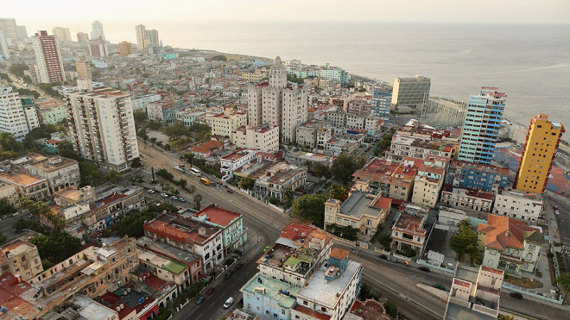 Tightly packed apartment buildings in varying states of repair and disrepair stand in the Vedado neighborhood near the historic Malecón oceanfront drive January 23, 2015 in Havana, Cuba. (Photo by Chip Somodevilla/Getty Images)