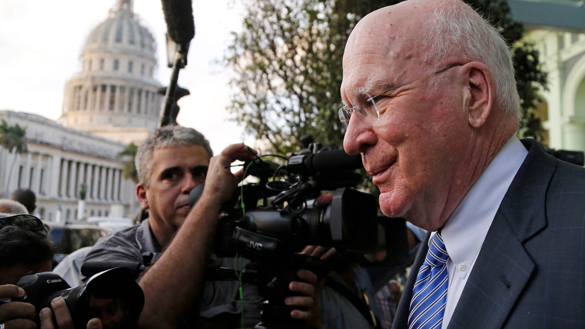 U.S. Senator Patrick Leahy from Vermont leaves after giving a press conference near the capitol building in Havana, Cuba, Monday, Jan. 19, 2015. Leahy, who is heading the first congressional delegation visit to Cuba since President Barack Obama announced in December plans for renewed relations with Cuba, met with Castro on past trips to Cuba but did not do so again on Monday, two days before Assistant Secretary of State Roberta Jacobson arrives in Havana to negotiate the reopening of the U.S. Embassy. (AP Photo/Desmond Boylan)