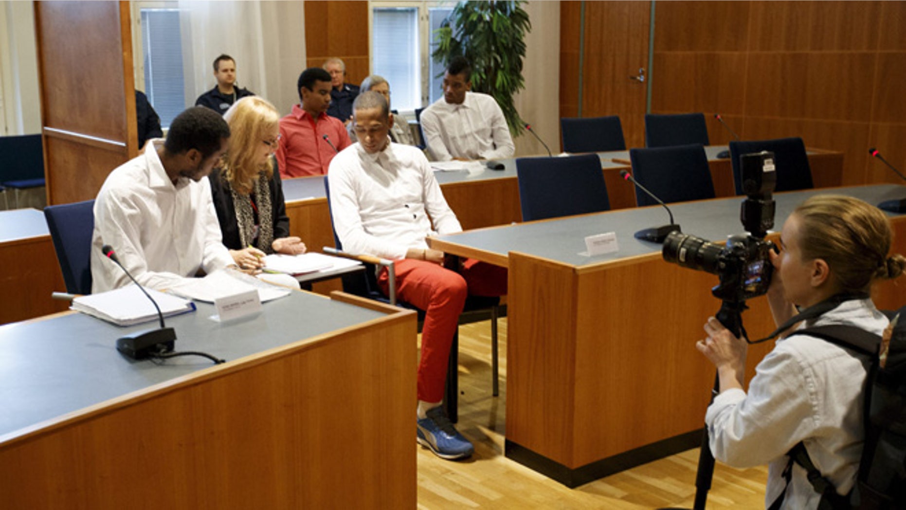 Players of Cuba's national volleyball team accused of rape appear before the court of Tampere, Finland, on August 29, 2016.