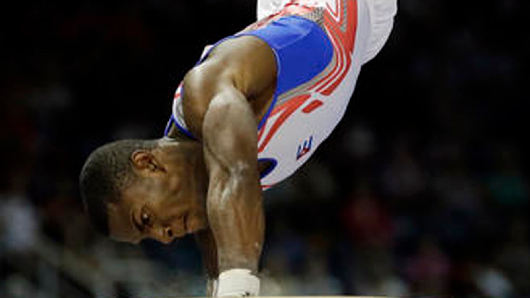 FILE - In this July 15, 2015, file photo, Cuba's Manrique Larduet performs during the artistic gymnastics vault competition at the Pan Am Games in Toronto. The powerful Larduet was a revelation at worlds last fall, finishing a surprising second. (AP Photo/Gregory Bull, File)