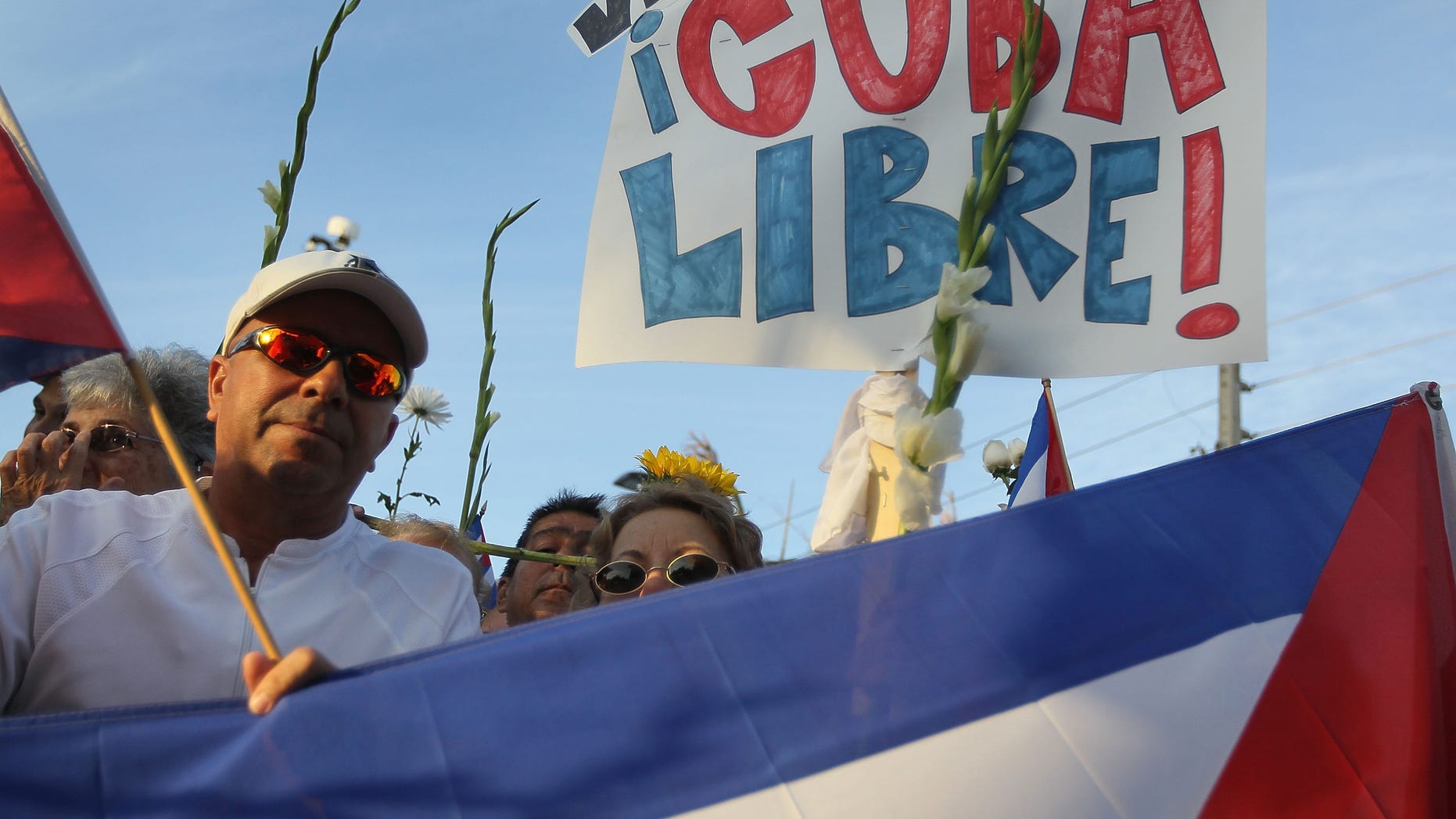 People show their support for an activist group in Cuba.