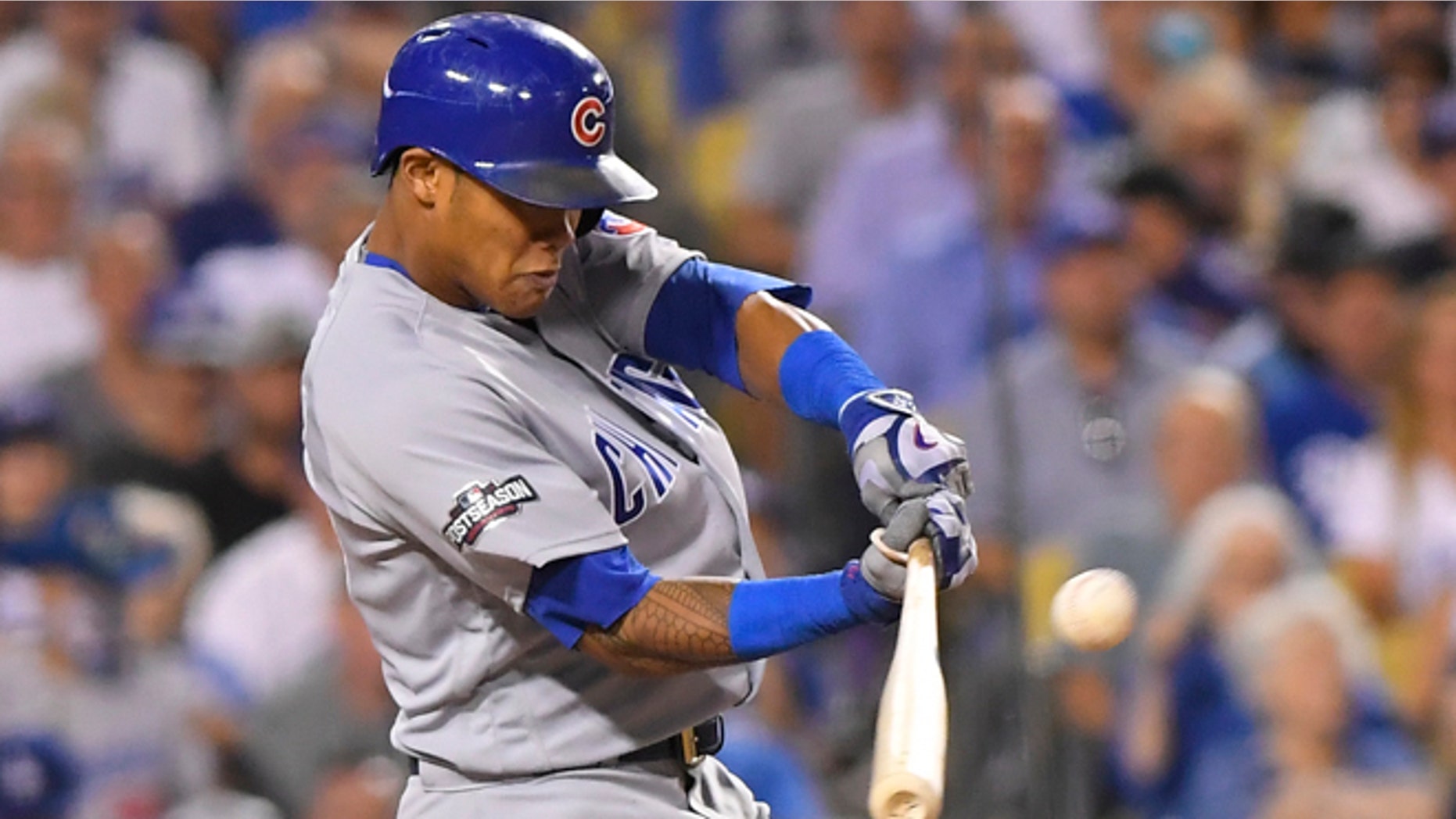 Chicago Cubs' Addison Russell hits a two-run home run off Los Angeles Dodgers relief pitcher Joe Blanton during the sixth inning of Game 5 of the National League baseball championship series Thursday, Oct. 20, 2016, in Los Angeles. (AP Photo/Mark J. Terrill)