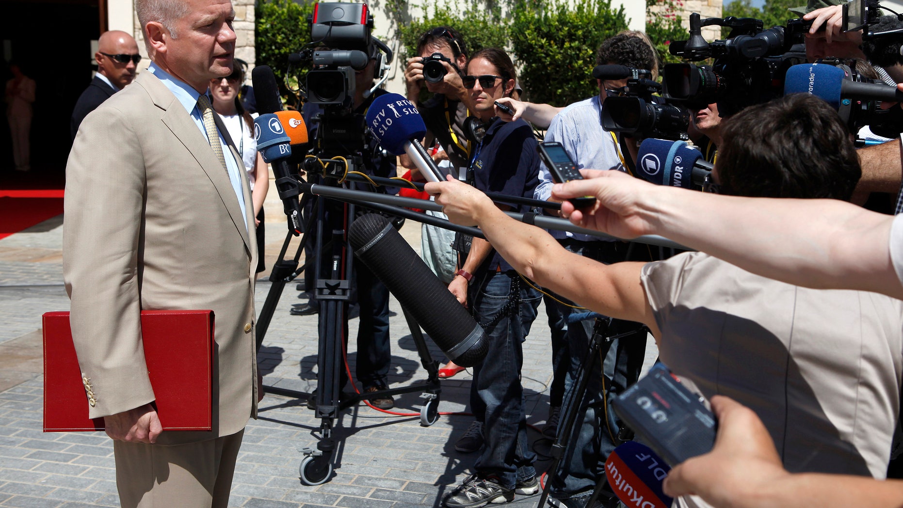 Sept. 7, 2012 - Britain's foreign minister William Hague speaks to the media as he arrives for the informal EU Foreign Affairs Ministers meeting in Kouklia outside of Paphos, Cyprus.