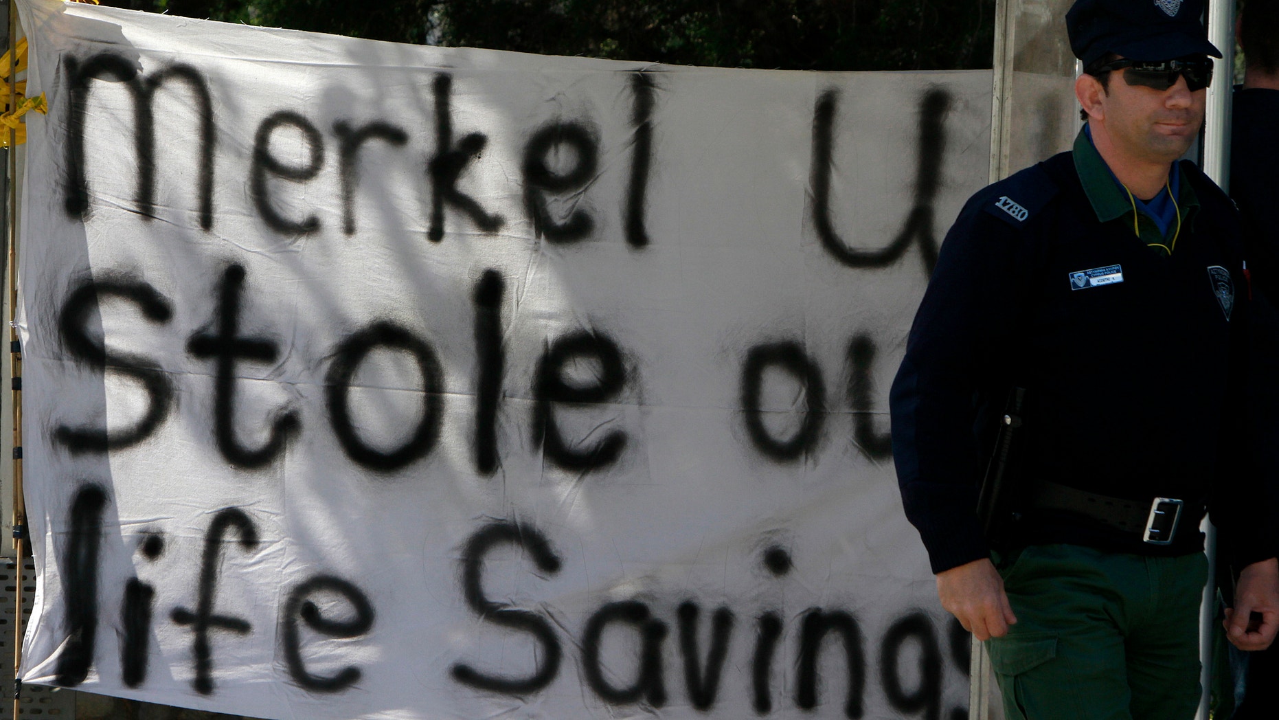 Cypriot banks and ATMs faced a run until they were ordered closed while the Parliament figures out how to satisfy demands of euro zone leaders. (AP)