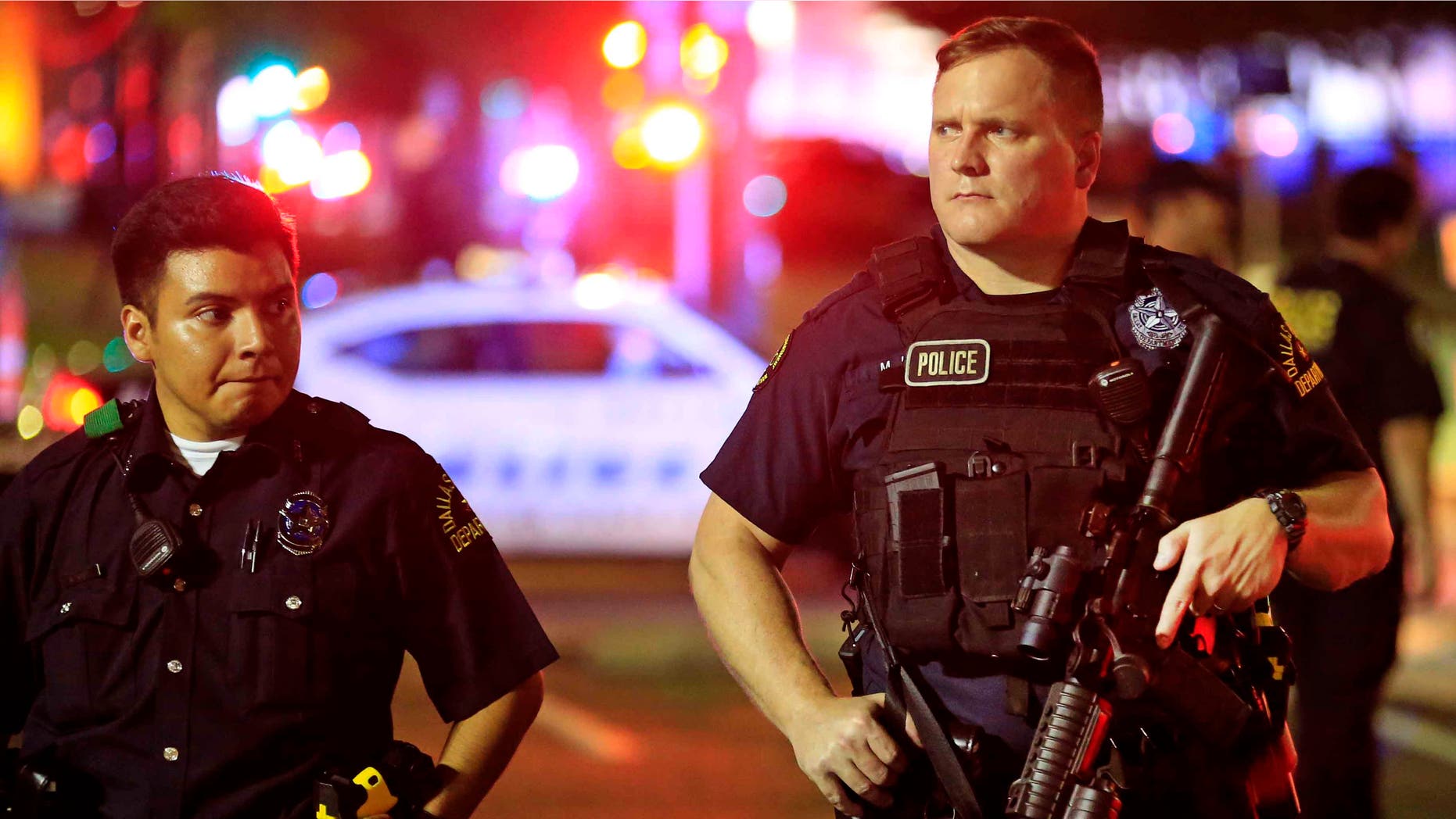 Dallas police near the scene where four police officers were shot and killed on July 7, 2016.