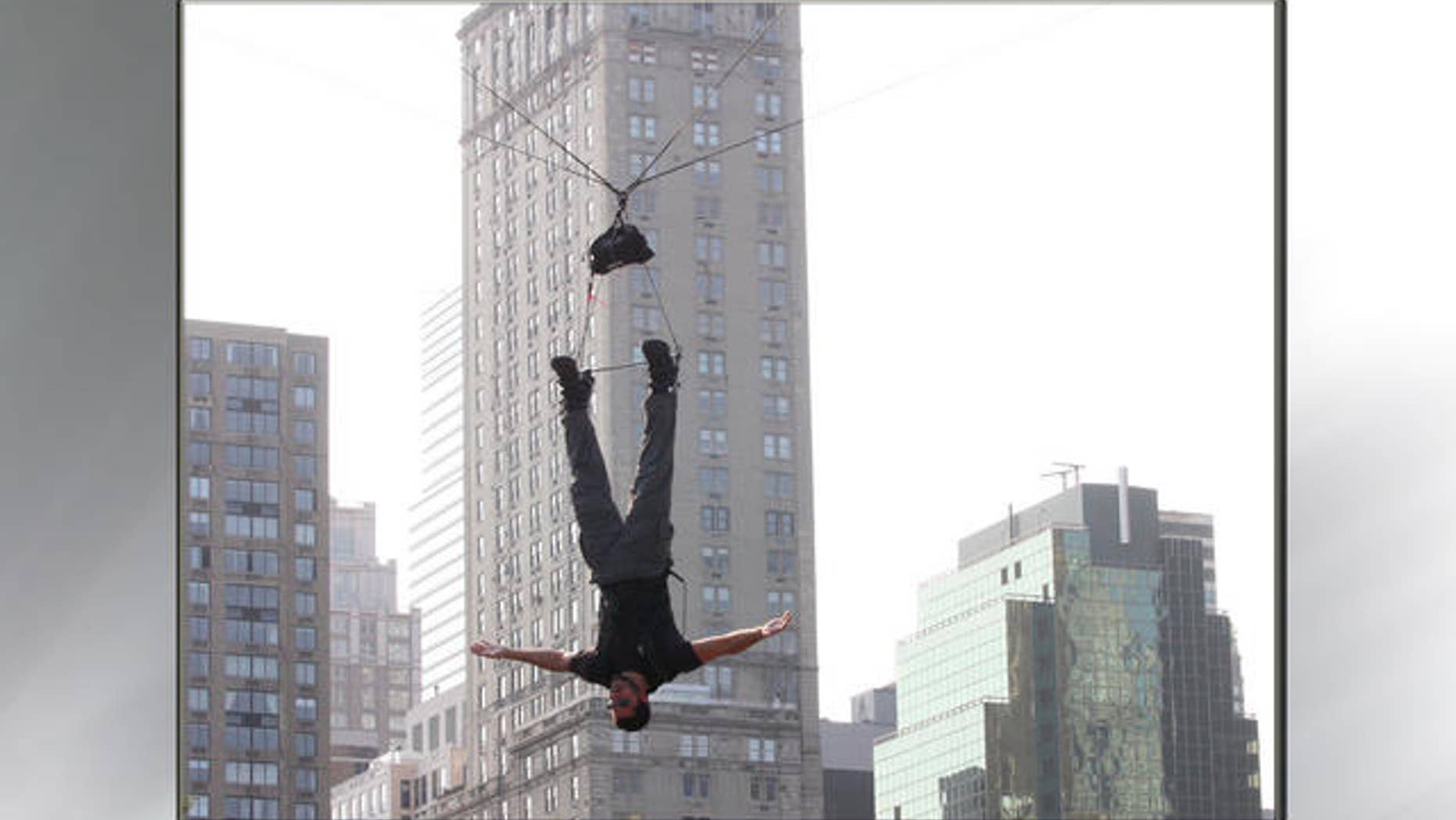 September 22, 2008 - FILE photo of David Blaine stunt hanging over Wollman Rink in New York's Central Park.