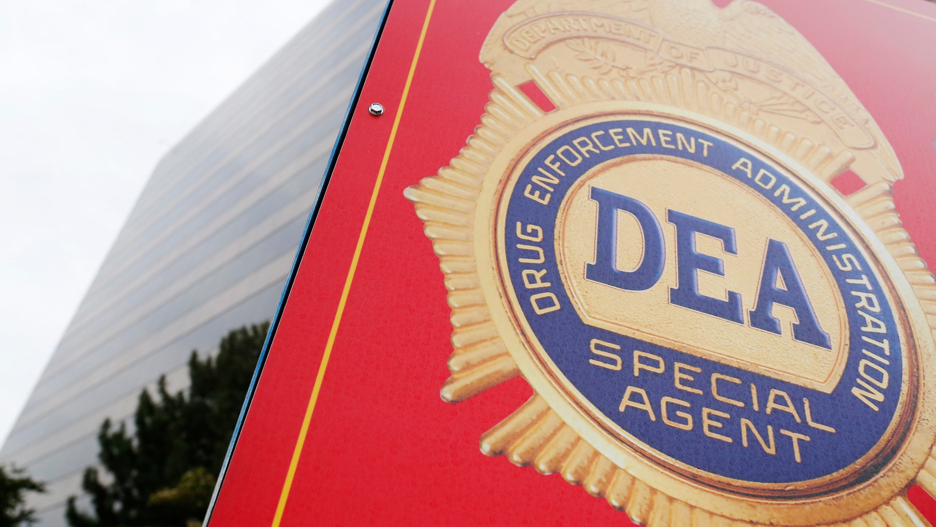 A sign with a DEA badge marks the entrance to the U.S. Drug Enforcement Administration Museum in Arlington, Virginia.