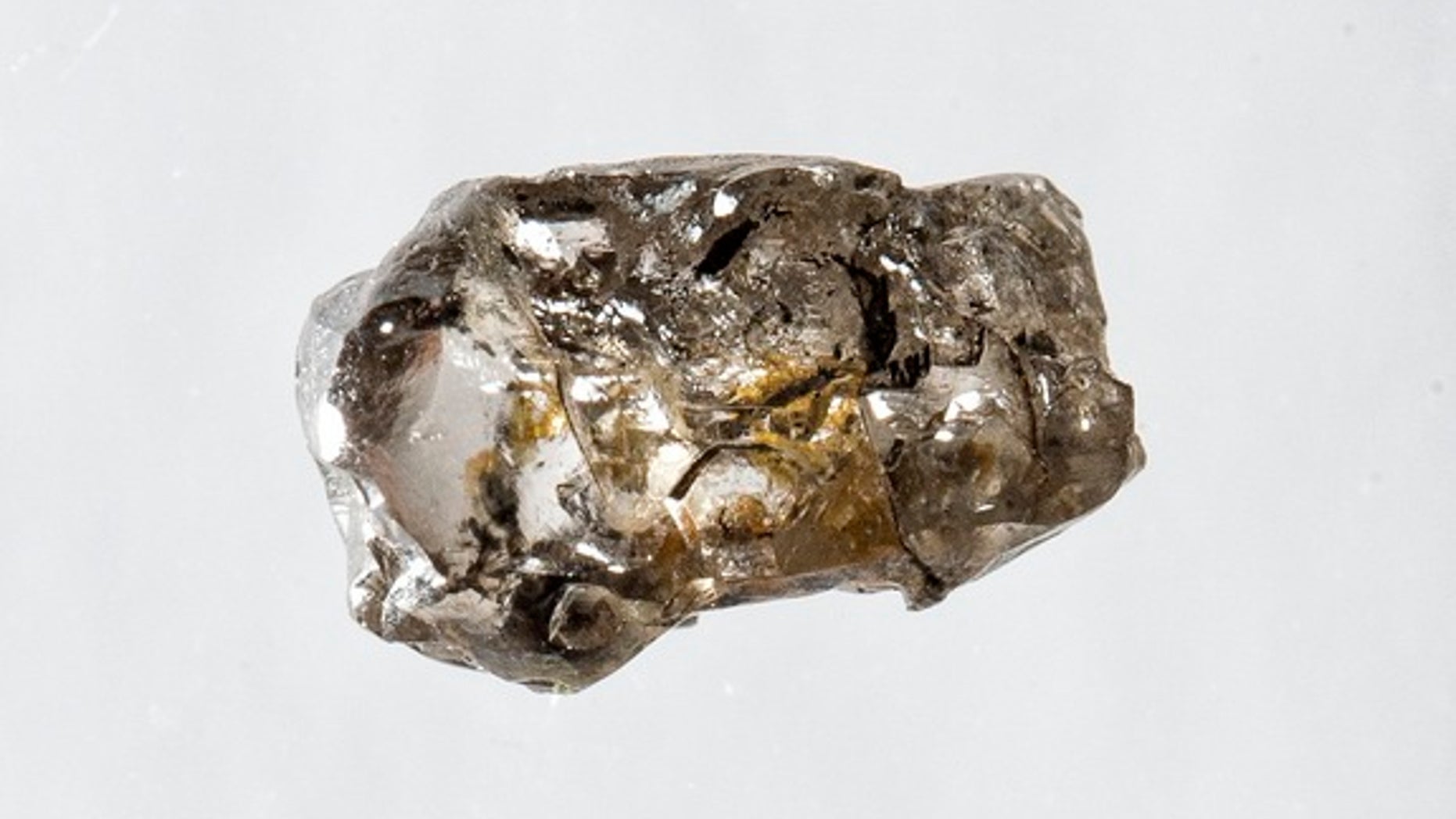 A diamond from Juína, Brazil, containing a water-rich inclusion of the olivine mineral ringwoodite.