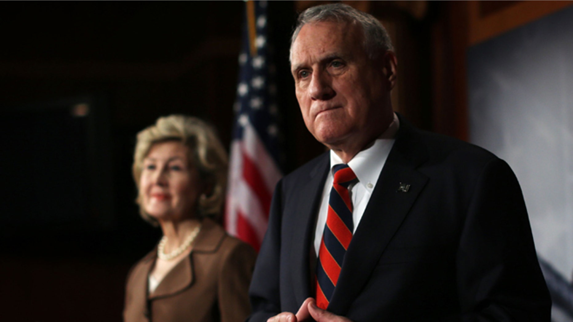 WASHINGTON, DC - NOVEMBER 27: U.S Senator Kay Bailey Hutchison (R-TX) (L) and Senator Jon Kyl (R-AZ) (R) listen during a news conference November 27, 2012 on Capitol Hill in Washington, DC. Senator Hutchison and Kyl held a news conference to discuss immigration reform. (Photo by Alex Wong/Getty Images)