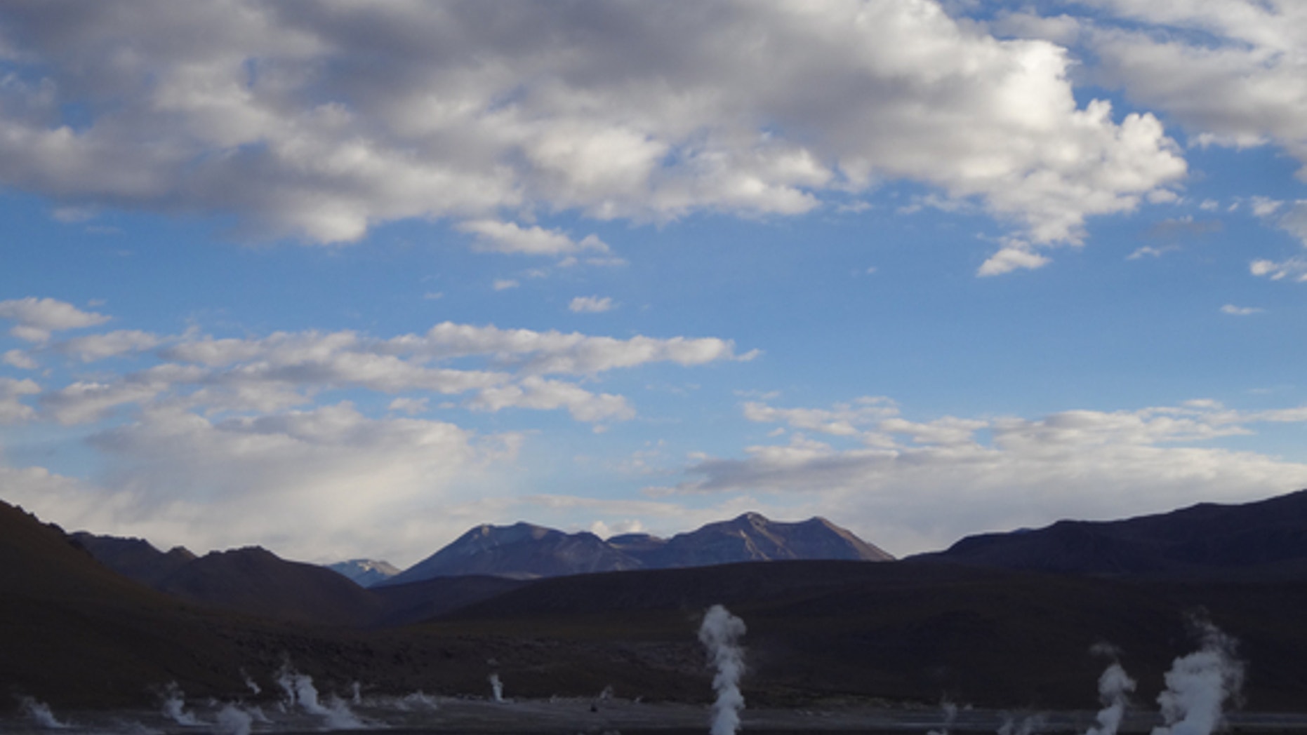 The El Tatio geyser field. There’s a bus to the right for scale.