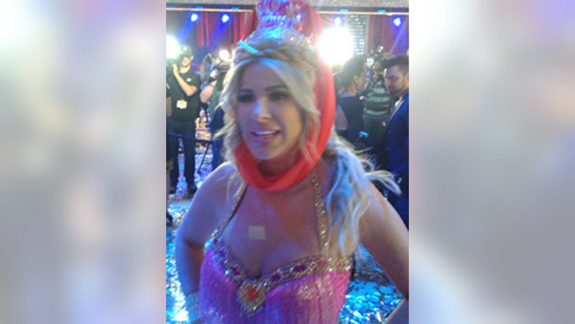 Nov. 24, 2015: Kim Zolciak talks to reporters after performing during the exhibition finale of 'Dancing With The Stars' in Los Angeles. (Carole Glines)