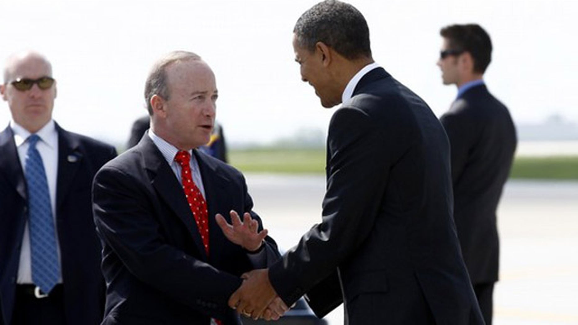 May 6: President Obama is greeted by Indiana Governor Mitch Daniels upon his arrival in Indianapolis.