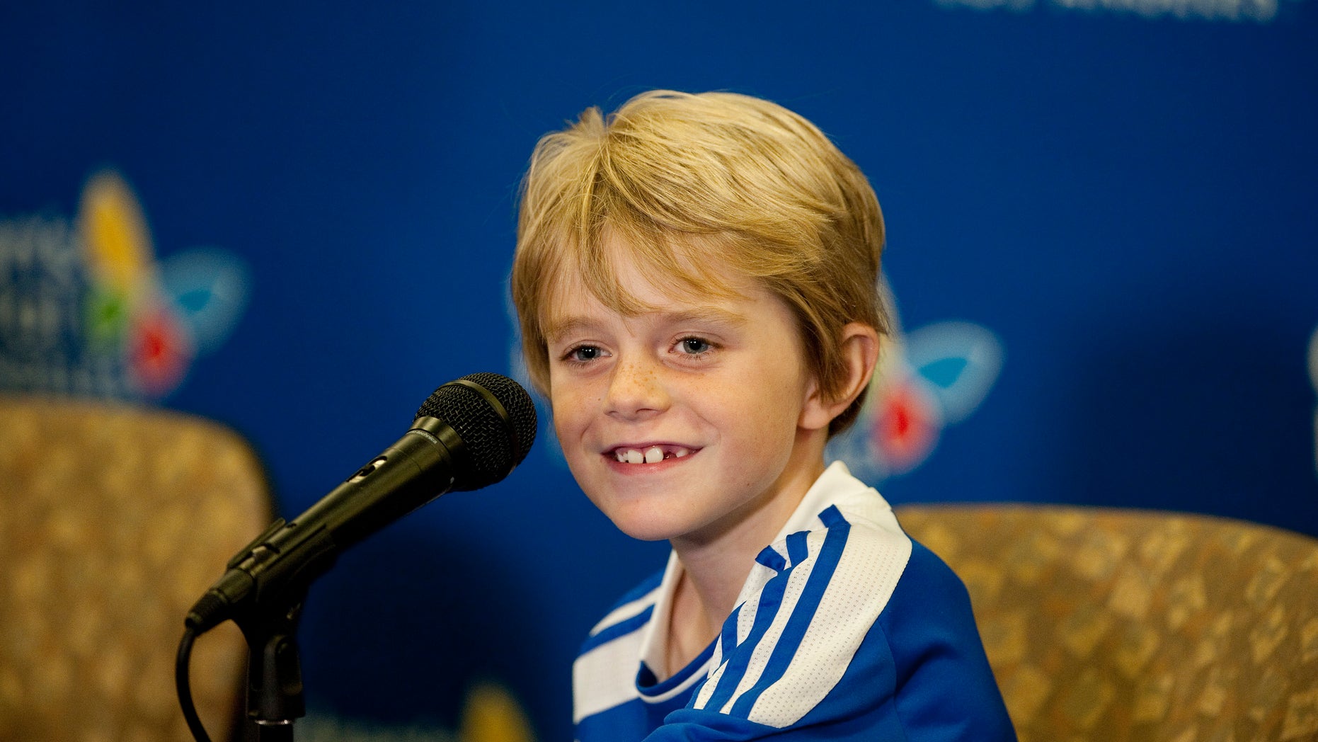 Max Page, 7, famous for his role as Darth Vader in a television commercial for a car, speaks during a news conference at Children's Hospital Los Angeles (AP Photo/Grant Hindsley)