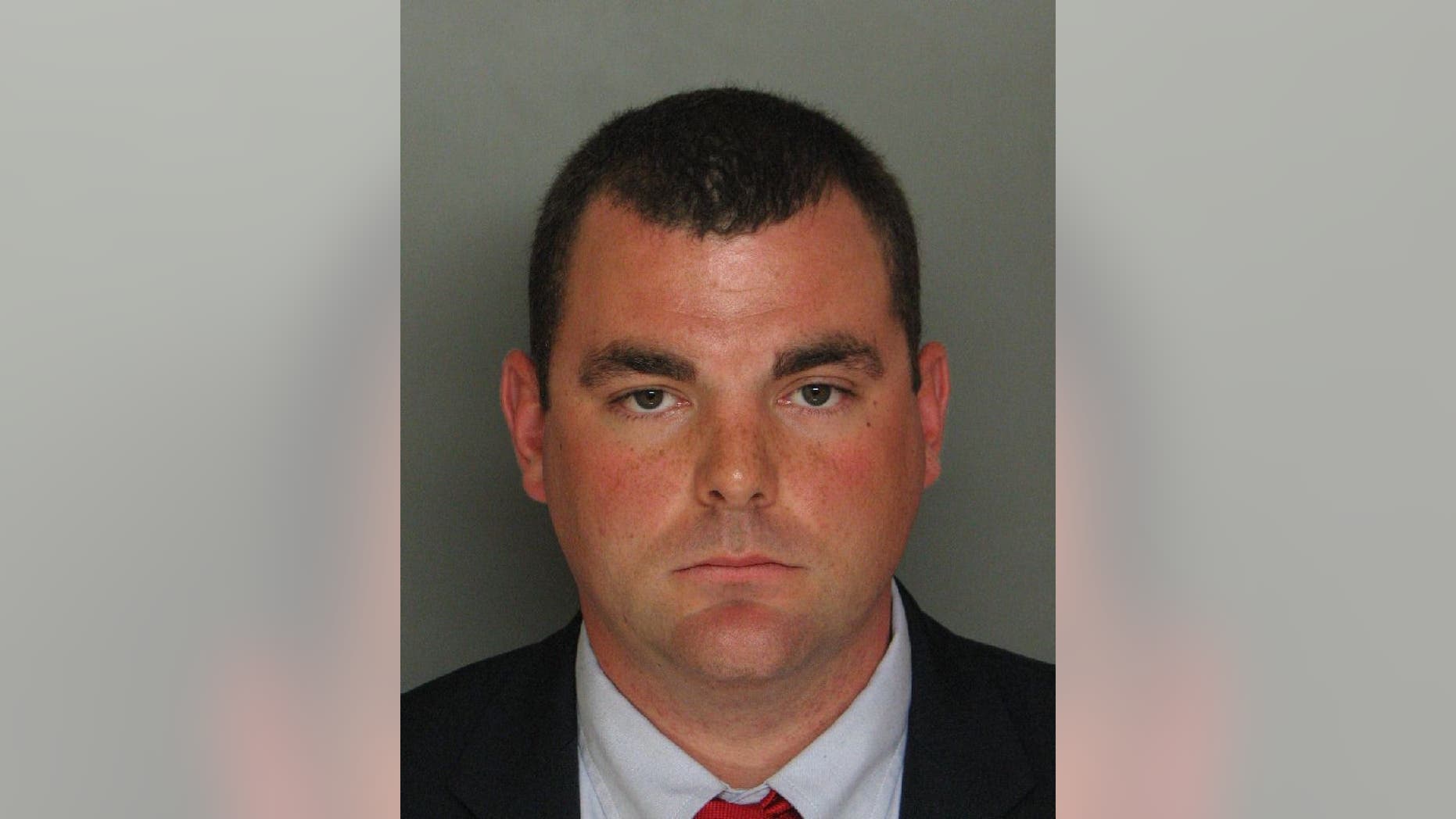This April 7, 2015, booking photo provided by Edgefield County Detention Center, shows Justin Craven, a North Augusta, S.C., police officer, who is charged in the shooting death of an unarmed driver in February 2014 in South Carolina. State police in South Carolina refuse to release dashcam video that apparently shows the white police officer shooting a 68-year-old black man to death in his driveway after a nine-mile car chase. (Edgefield County Detention Center via AP)
