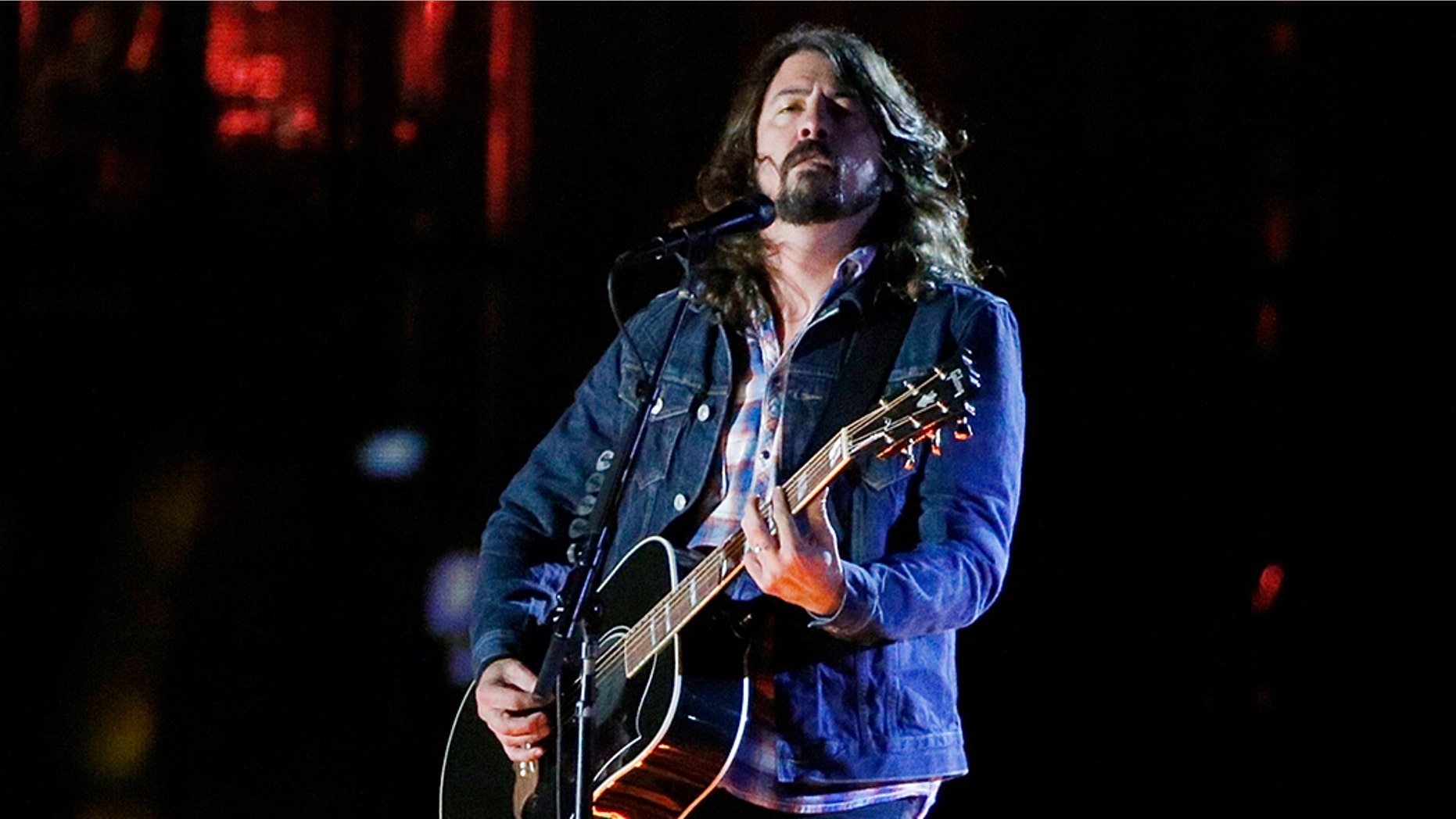 Dave Grohl called President Trump a "massive jerk" and said he was "ashamed" of him.