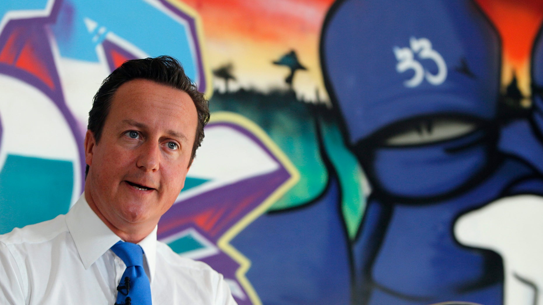 August 15: Britain's Prime Minister David Cameron speaks at a youth center in Witney, his Parliamentary district in southern England. Britain must confront its "slow-motion moral collapse" Cameron declared following four days of riots that left five people dead, thousands facing criminal charges and at least 200 million pounds ($326 million) in property losses.