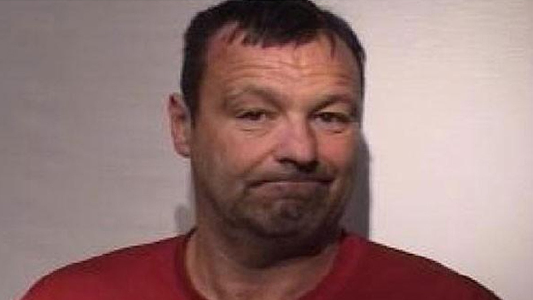 David Howard is accused of trying to push two boys in front of a train.