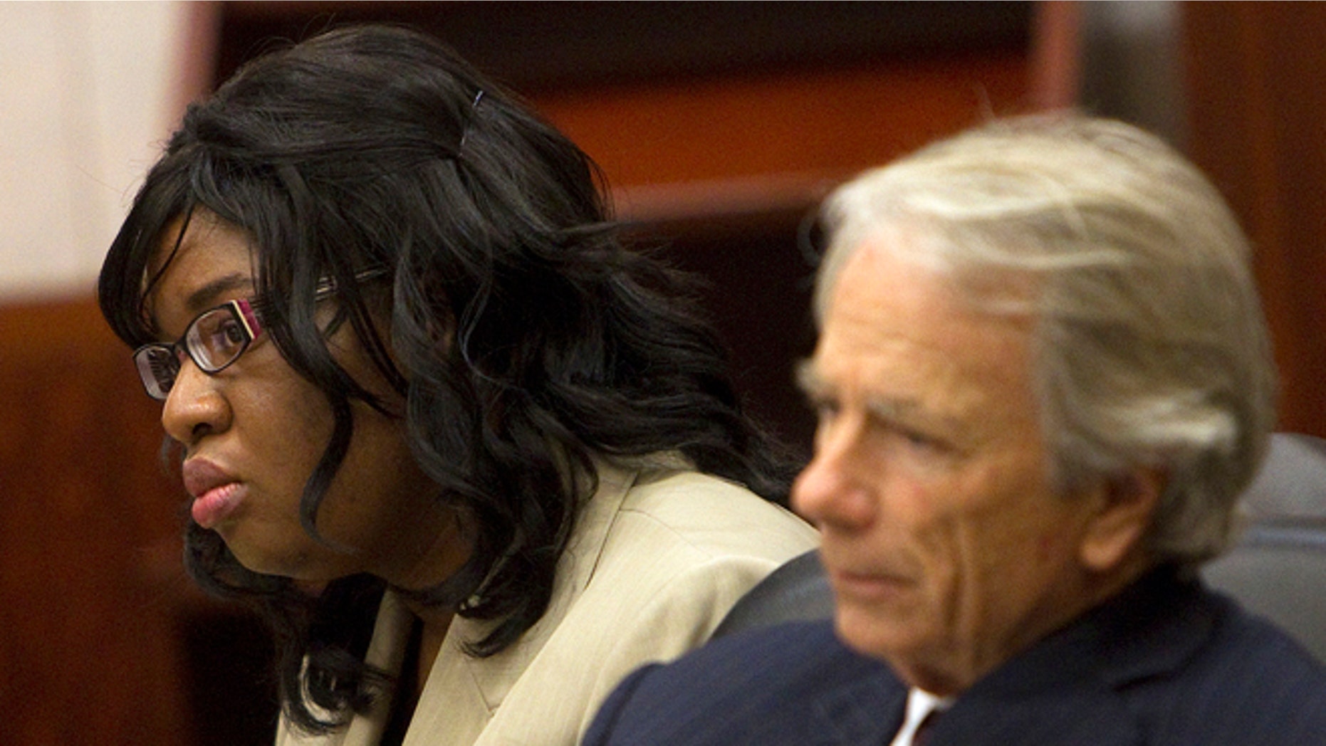 Nov. 12, 2012: In this file photo, home day care operator Jessica Tata, left, and her attorney Mike DeGeurin listen to the closing arguments in her murder trial for the death of 16-month-old day care fire victim, Elias Castillo, at the Harris County Criminal Justice Center, in Houston.