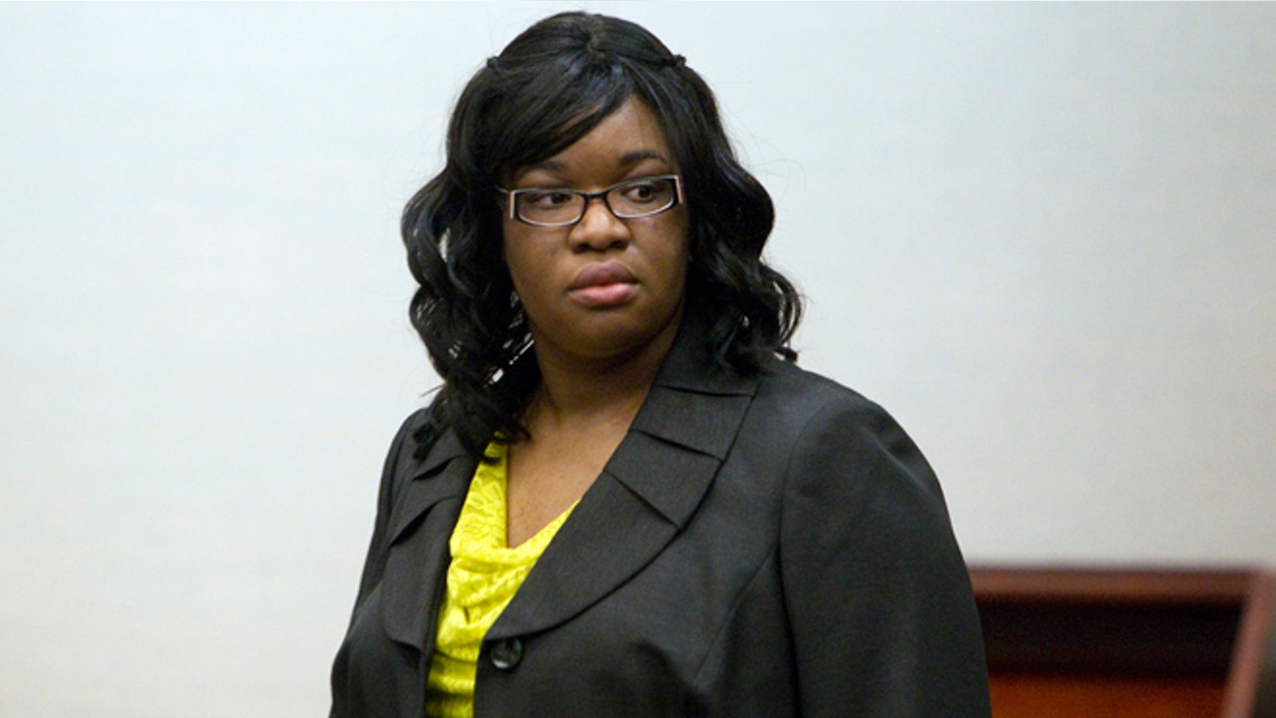 Nov. 13, 2012: Home day care operator Jessica Tata stands before her verdict at the Harris County Criminal Justice Center in Houston.