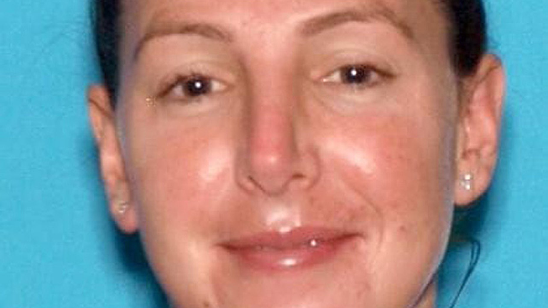 West Orange High School teacher Erica DePalo, 33, of Montclair, N.J., was charged Friday with first-degree aggravated sexual assault, second-degree sexual assault and endangering the welfare of a child. (Essex County Prosecutor's Office)