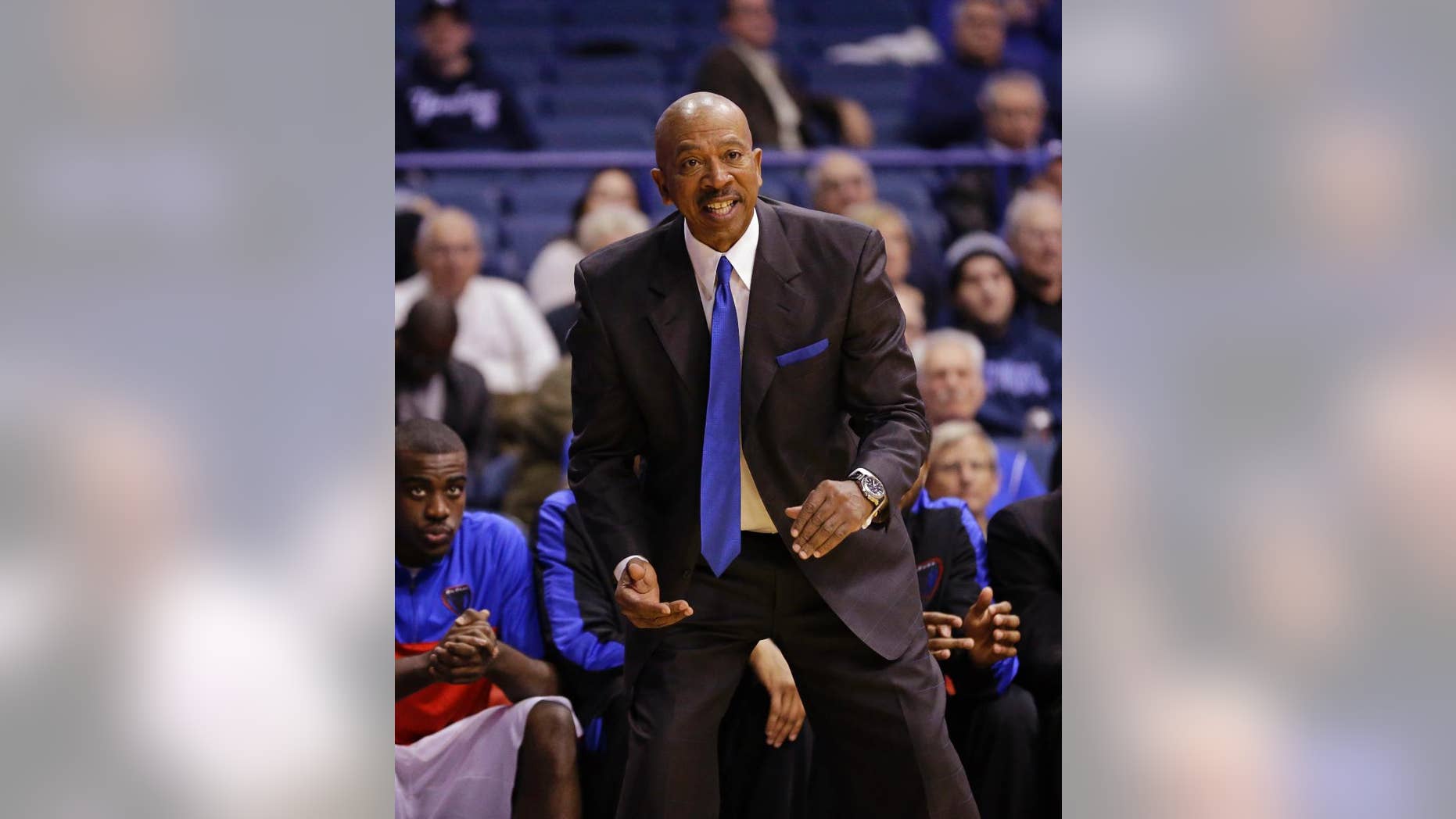 FILE - In this Nov. 13, 2013 file photo, DePaul head coach Oliver Purnell reacts as he watches his team play Southern Mississippi in an NCAA college basketball game in Rosemont, Ill. No matter how bad DePaul has been in recent years, Purnell can envision the Blue Demons winning the Big East. They went 12-21 and finished last in the Big East at 3-15 a year ago. But Purnell insists they’re ready to make a jump with Big East Rookie of the Year Bill Garrett Jr. and the 6-foot-11 Tommy Hamilton IV leading the way. (AP Photo/Nam Y. Huh)
