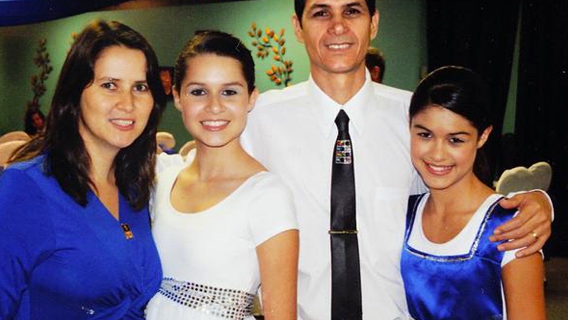 The Carmo family, Adriana, Leticia, 17, Jose Jr. and Lidiane, 15, pose at the church in Marietta, Ga. Florida Highway Patrol spokesman Lt. Patrick Riordan confirmed Jose Carmo Jr., Adriana Carmo, Leticia Carmo and Edson Carmo, not shown in picture, as victims in the Sunday crash in Florida that killed 10 people.