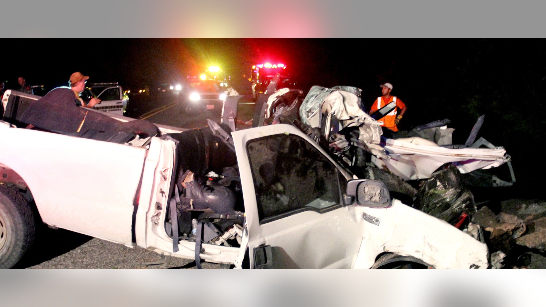 This July 22, 2012, photo shows a pickup truck that authorities say was overloaded with passengers when it veered off a highway and crashed into trees near Goliad, Texas, killing at least 13 people and injuring 10. Officials said at least 23 passengers were crammed inside the truck's cab and bed, including at least two young children. (AP Photo/The Victoria Advocate, Angeli Wright)