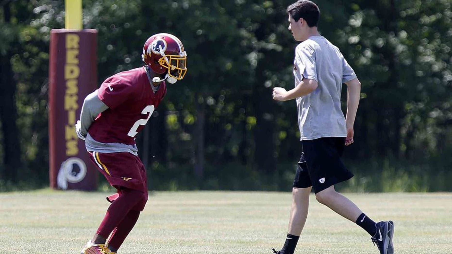 May 26, 2015; Ashbury, VA, USA; Washington Redskins cornerback DeAngelo Hall (2) participates in drills during the Redskins OTA at Redskins Park. Mandatory Credit: Geoff Burke-USA TODAY Sports