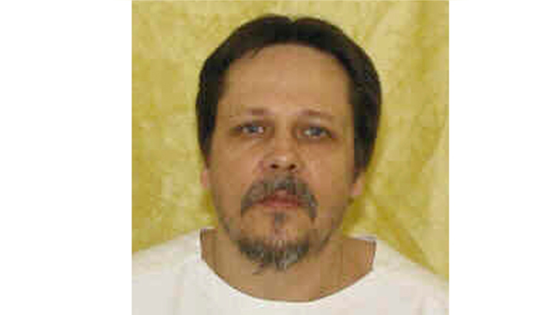 This undated file photo provided by the Ohio Department of Rehabilitation and Correction shows Dennis McGuire.