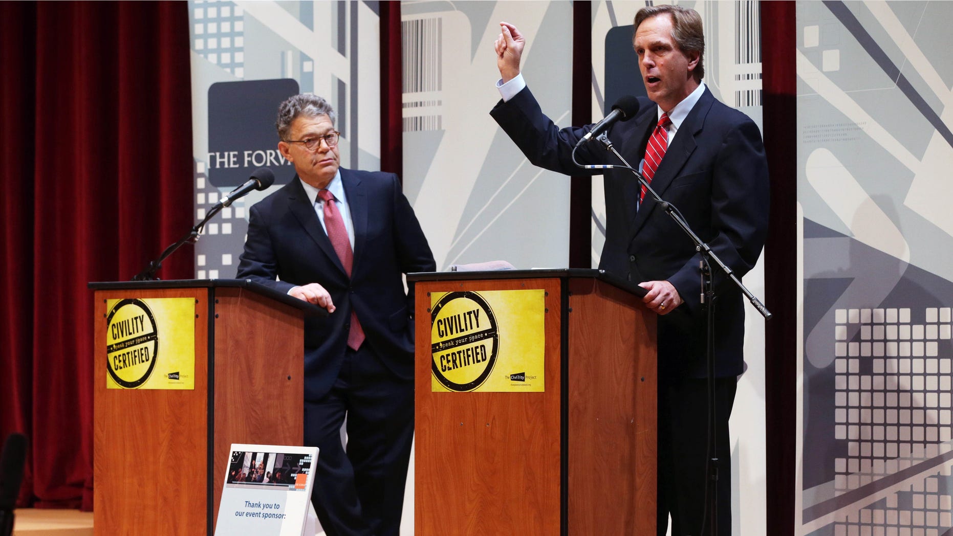 Oct. 1, 2014: Democratic U.S. Sen. Al Franken, left, listens as his Republican challenger Mike McFadden gives his closing statement during their debate.