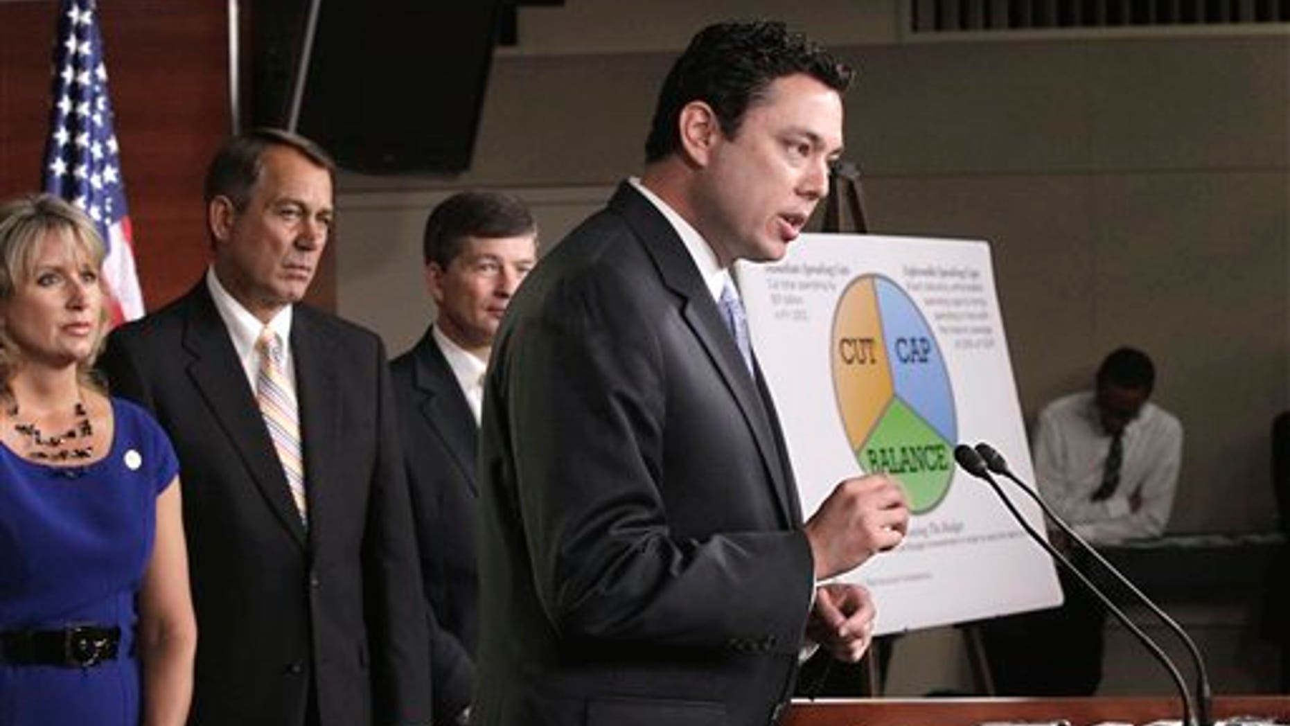 July 19: Budget Committee member Rep. Jason Chaffetz, R-Utah, right, talks about his "cut, cap and balance" plan proposed by tea party-backed House Republicans, during a news conference on Capitol Hill in Washington. From left are, Rep. Renee Ellmers, R-N.C., House Speaker John Boehner of Ohio,, Republican Conference Chairman Rep. Jeb Hensarling, R-Texas, and Chaffetz.