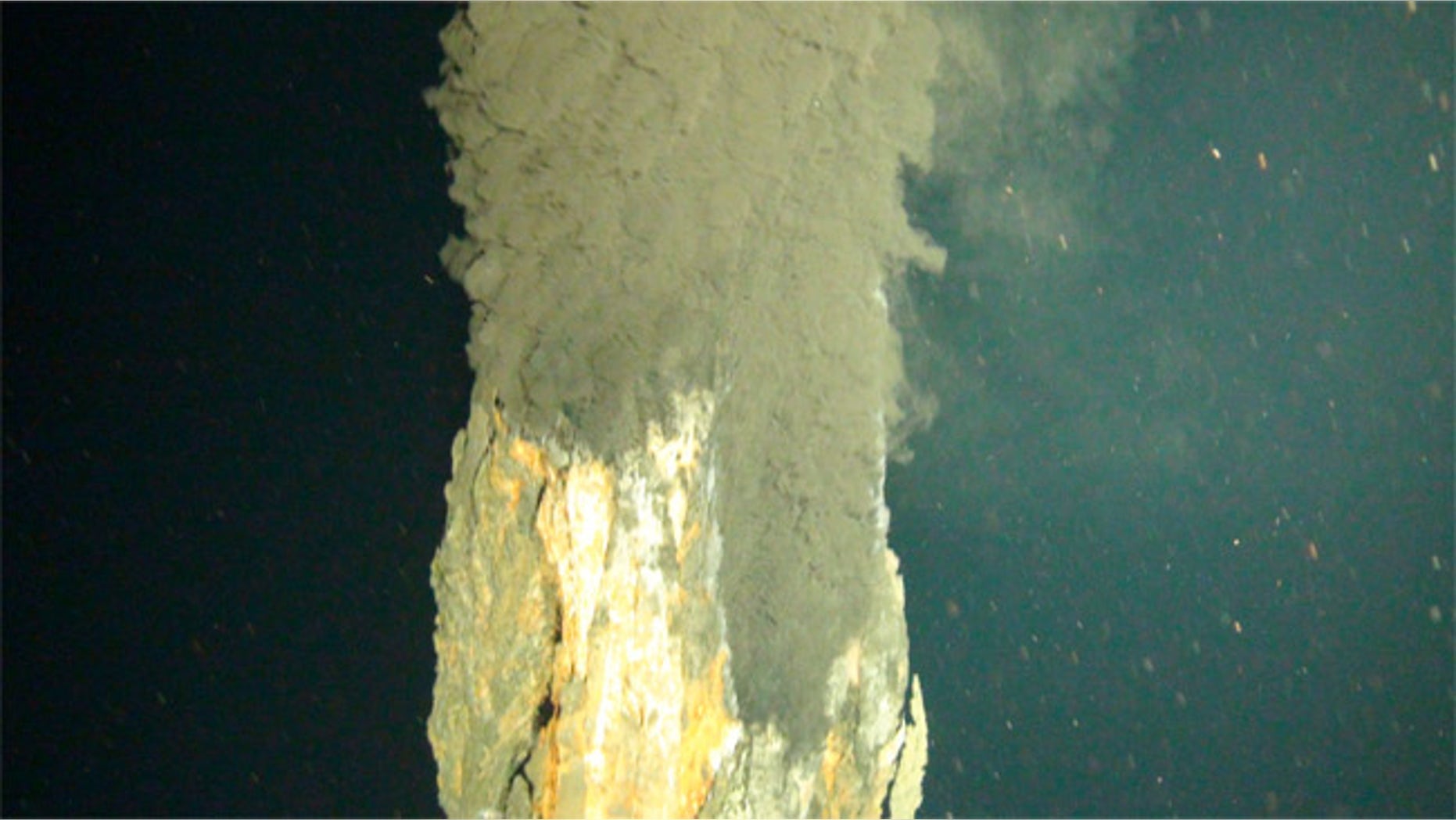 First photograph of the world's deepest known 'black smoker' vent, erupting water hot enough to melt lead, 3.1 miles deep on the ocean floor in the Caribbean.