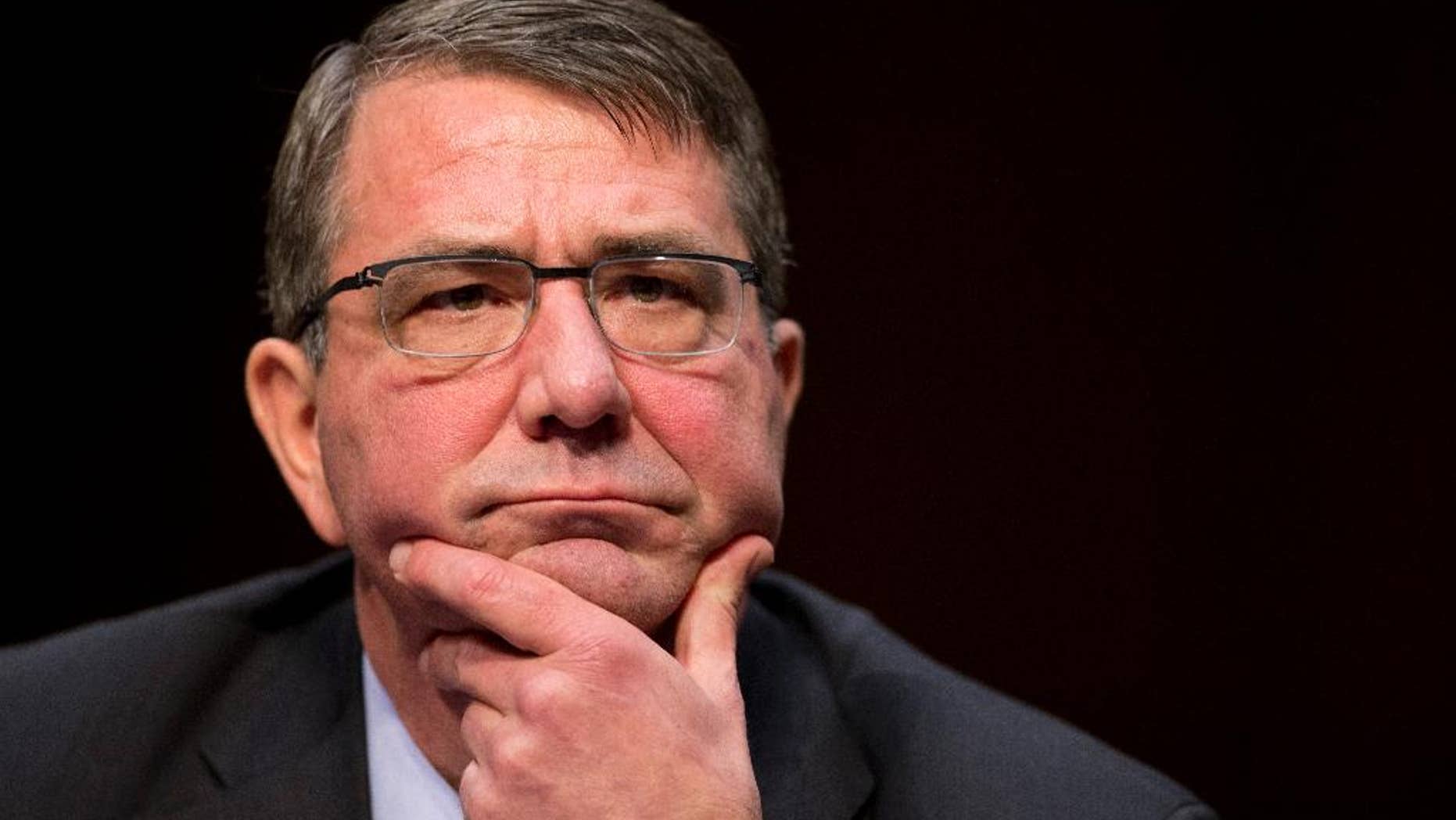 Defense Secretary Ash Carter testifies on Capitol Hill in Washington, Tuesday, March 3, 2015, before the Senate Armed Services Committee hearing to review the defense authorization request for fiscal 2016 and the future years defense program. (AP Photo/Manuel Balce Ceneta)