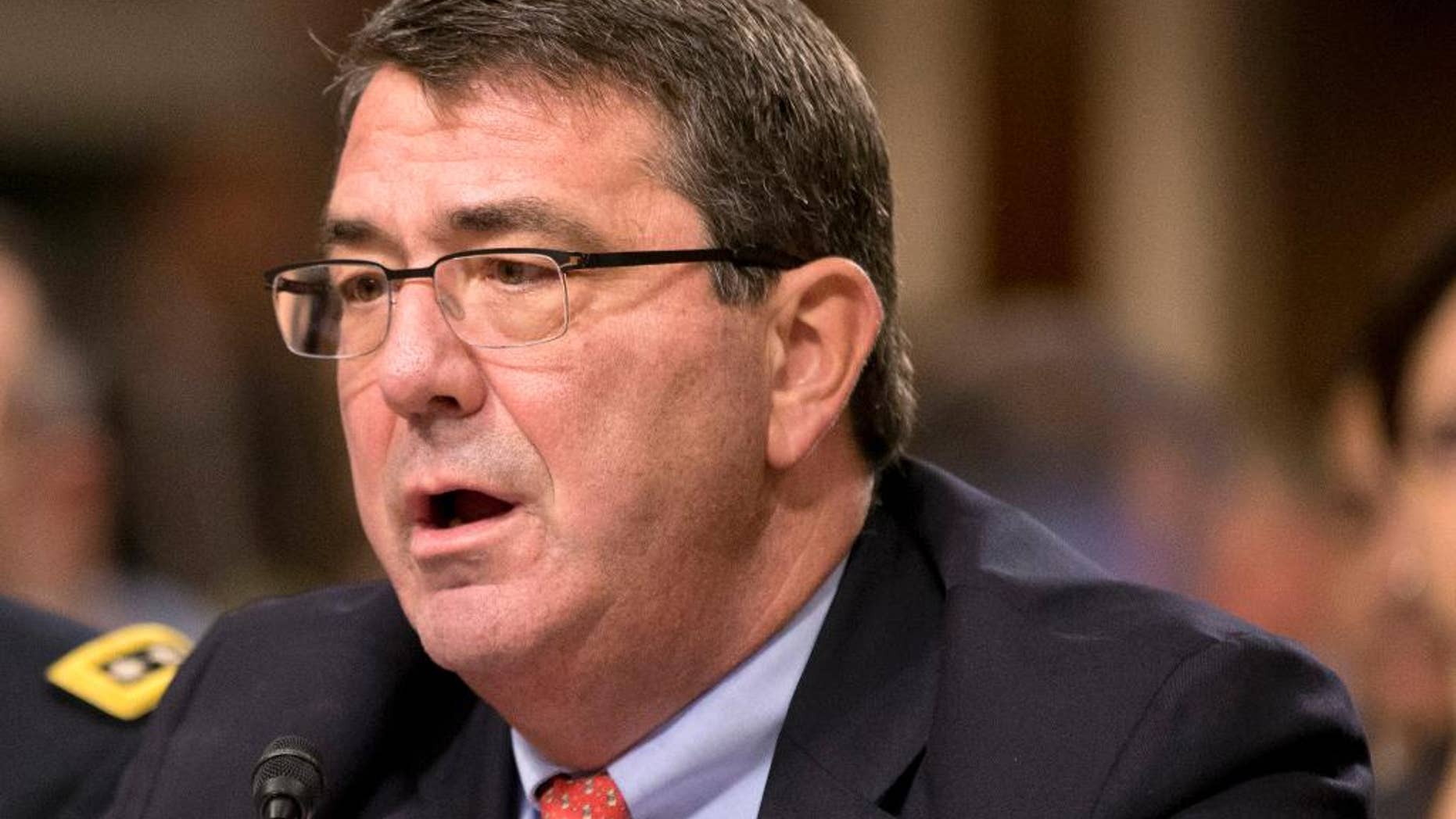 FILE - In this Feb. 12, 2013 file photo, Ashton Carter testifies on Capitol Hill in Washington. Carter has emerged as President Barack Obama's top candidate to become the next defense secretary, according to administration officials, putting him in line to take over a sprawling department that has had an uneasy relationship with the White House. (AP Photo/J. Scott Applewhite, File)