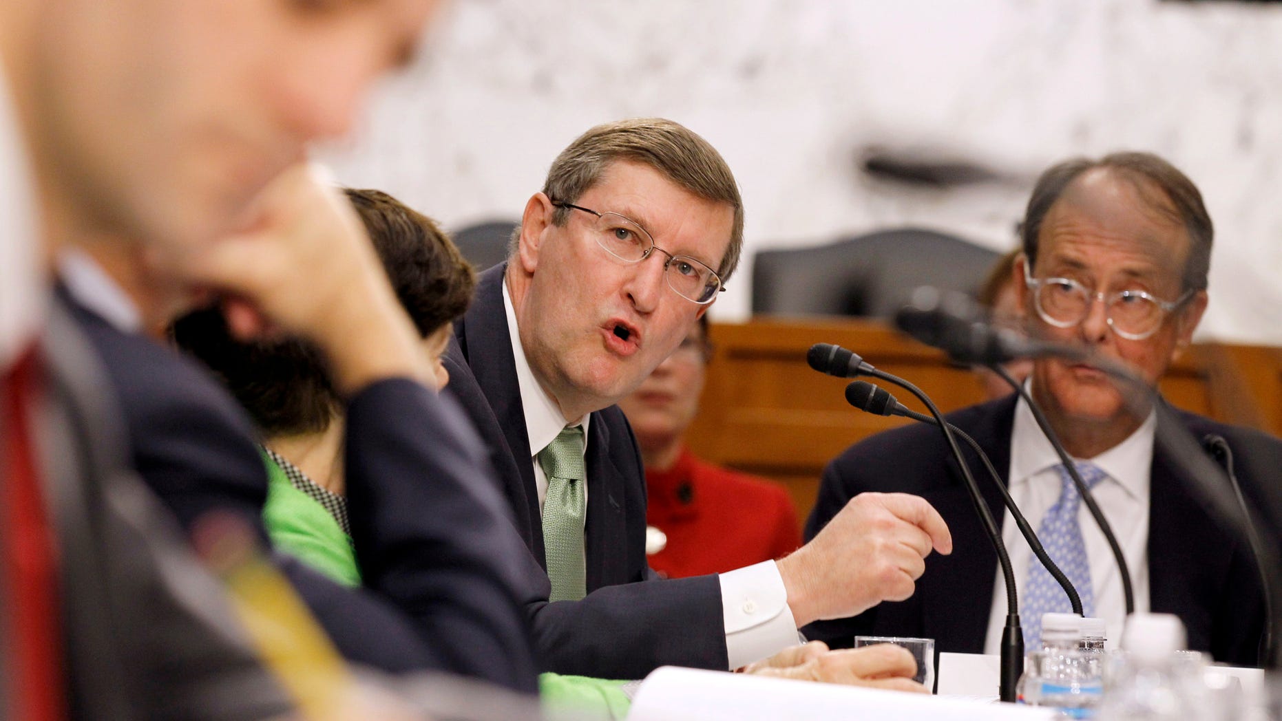 Dec. 1: Debt Commission member and Senate Budget Committee Chairman Sen. Kent Conrad, D-N.D., center, speaks during a meeting of the commission on Capitol Hill in Washington, D.C.
