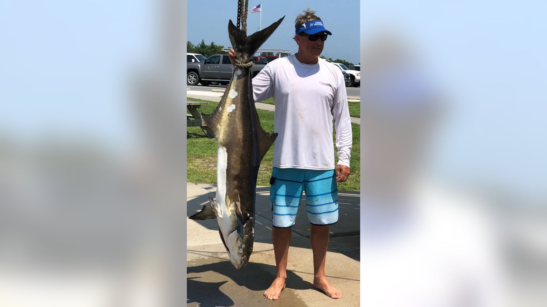 John Burbage, of Ocean View, wrestled with his massive catch for over an hour before reeling it in.
