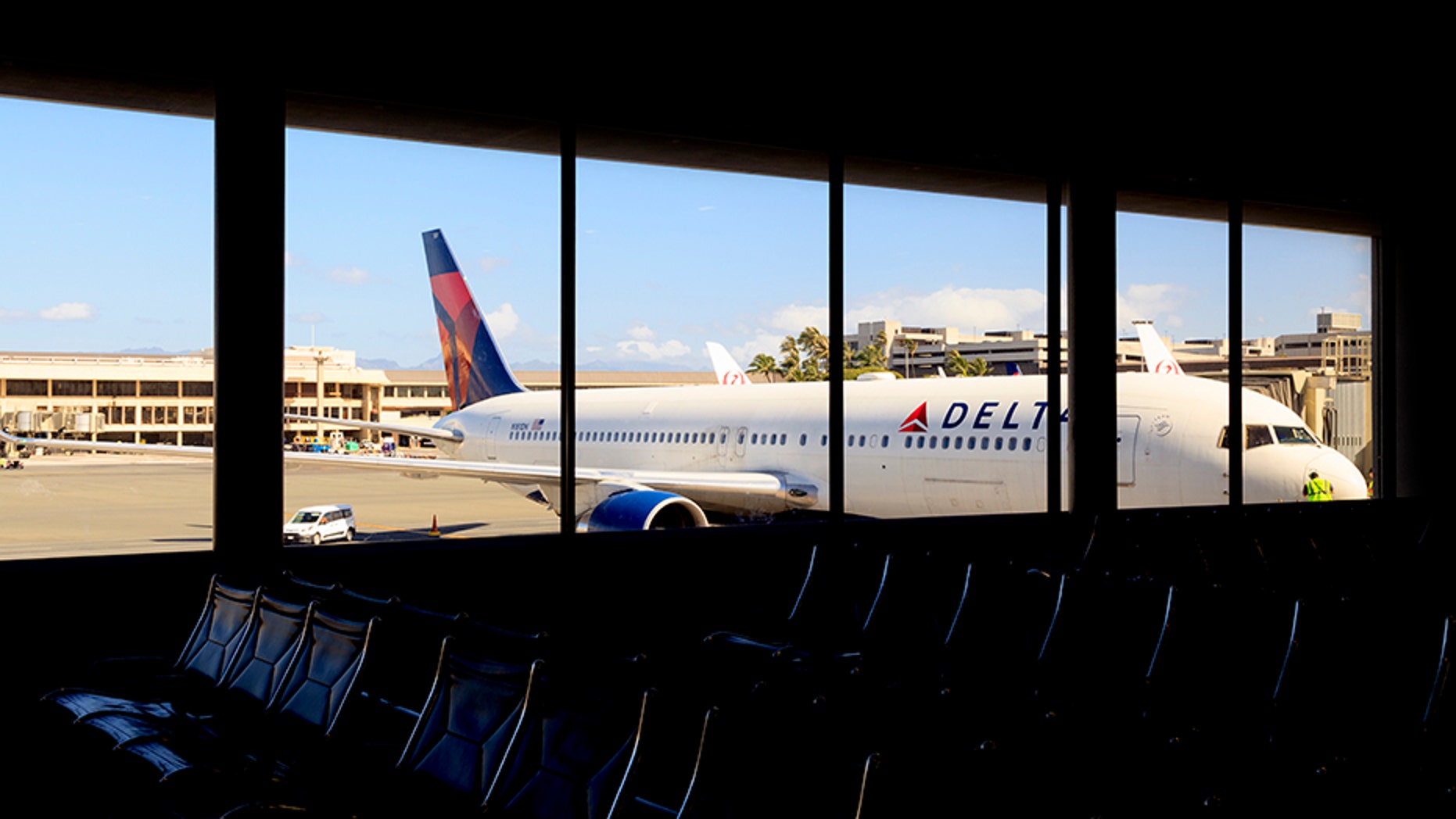 Two plane wings clipped each other on the tarmac at Logan Airport.
