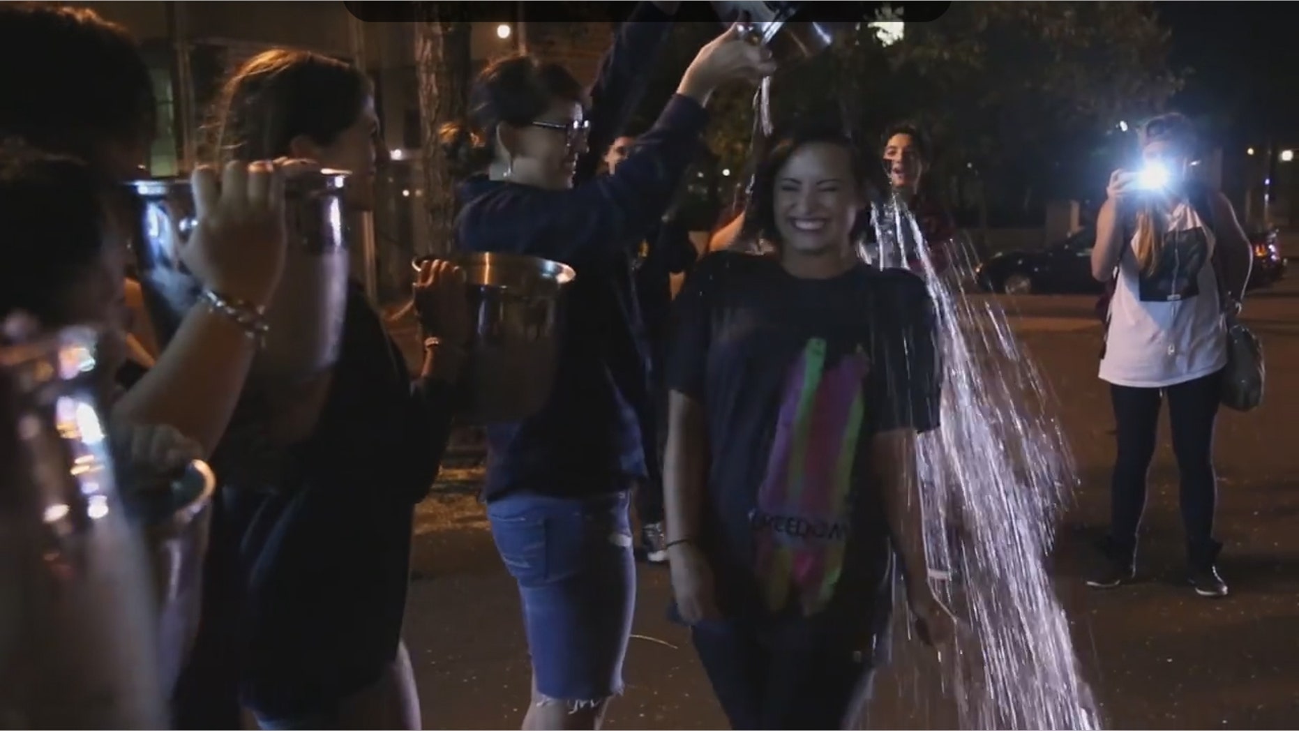 Singer Demi Lovato taking the ALS Ice Bucket Challenge.