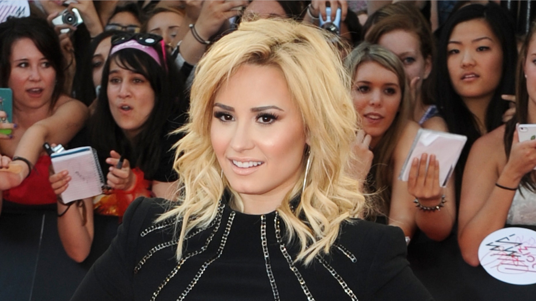 TORONTO, ON - JUNE 16: Demi Lovato arrives on the red carpet at the 2013 MuchMusic Video Awards at Bell Media Headquarters on June 16, 2013 in Toronto, Canada. (Photo by Jag Gundu/Getty Images)