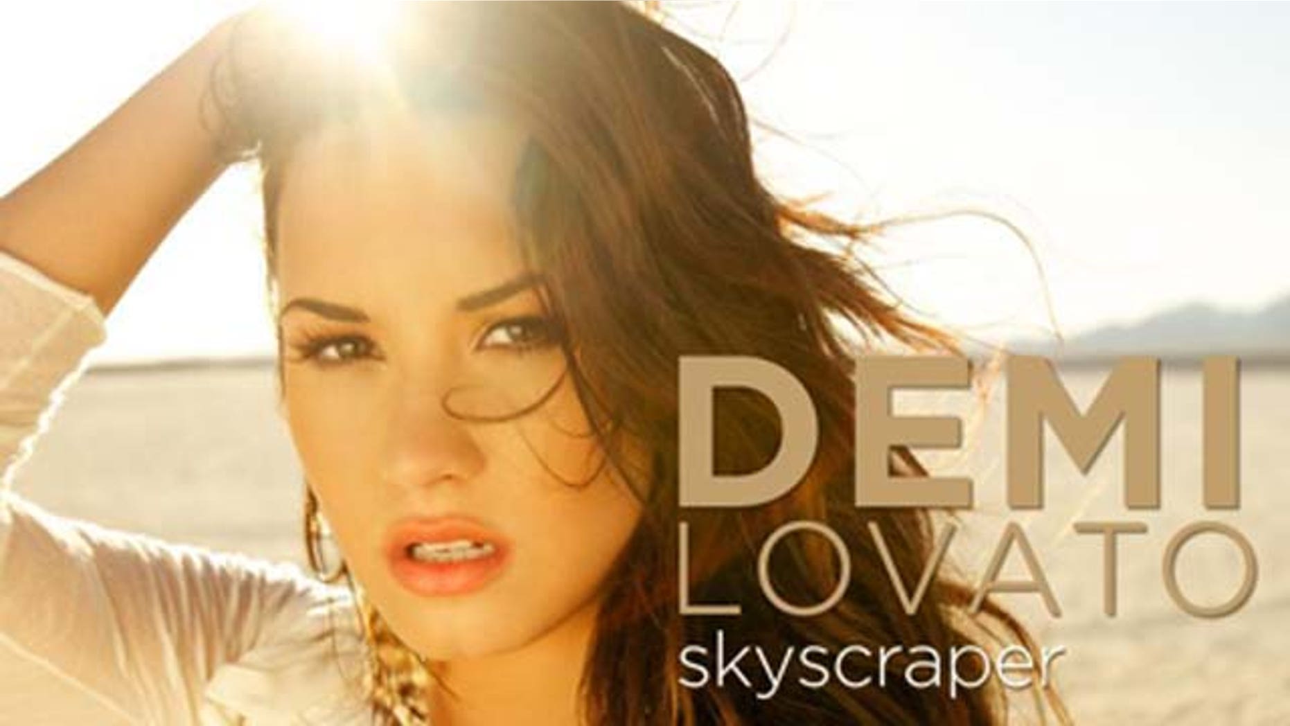 July 4, 2011: Demi Lovato released the cover for her new single "Skyscraper" available digitally July 14, 2011.