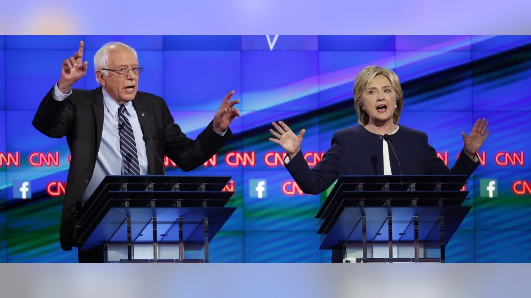 Democratic presidential candidates Sen. Bernie Sanders and former Secretary of State Hillary Clinton debate during the first official Democratic candidates debate of the 2016 presidential campaign in Las Vegas, Oct. 13, 2015. (REUTERS/Lucy Nicholson)