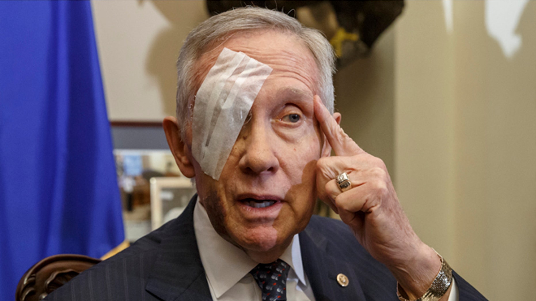 Senate Minority Leader Harry Reid of Nev., 75, talks to reporters on Capitol Hill in Washington, Thursday, Jan. 22, 2015.