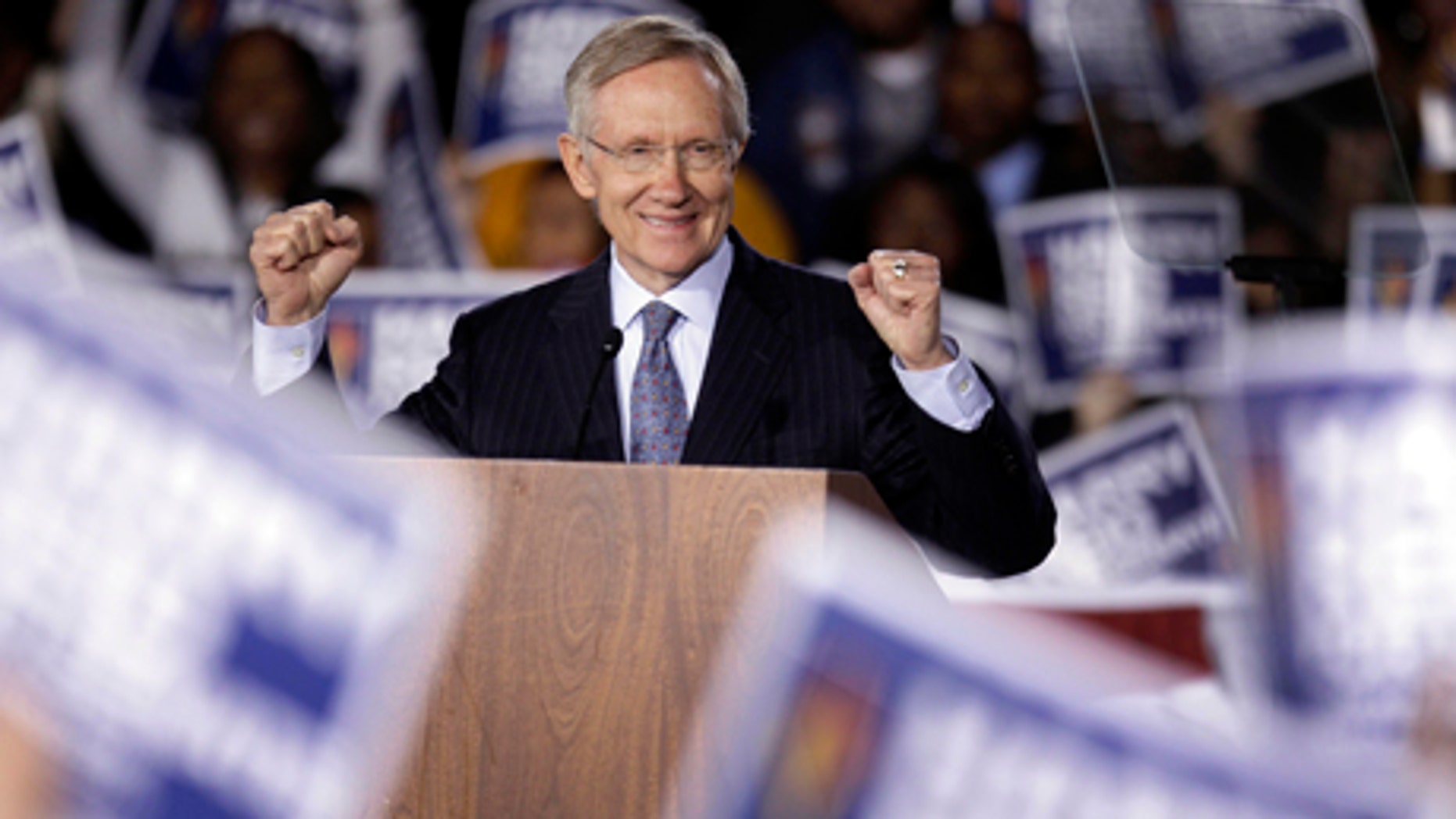 Senate majority leader Harry Reid acknowledges supporters during a rally Monday, Nov. 1, 2010, in Las Vegas. (AP Photo/Julie Jacobson)