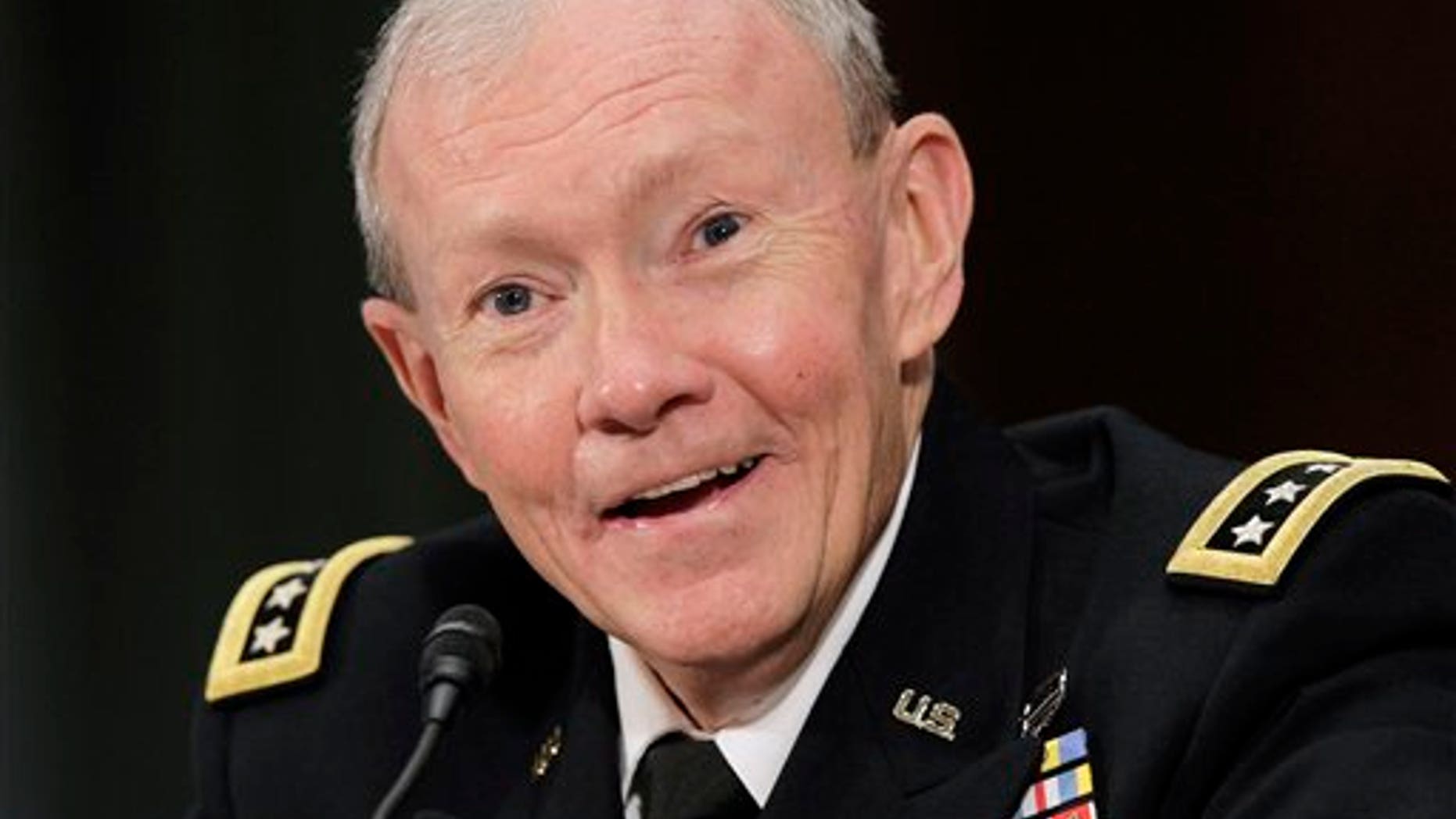 July 26: Army Gen. Martin Dempsey testifies on Capitol Hill in Washington before the Senate Armed Services Committee hearing on his nomination to become the next Joint Chiefs chairman.