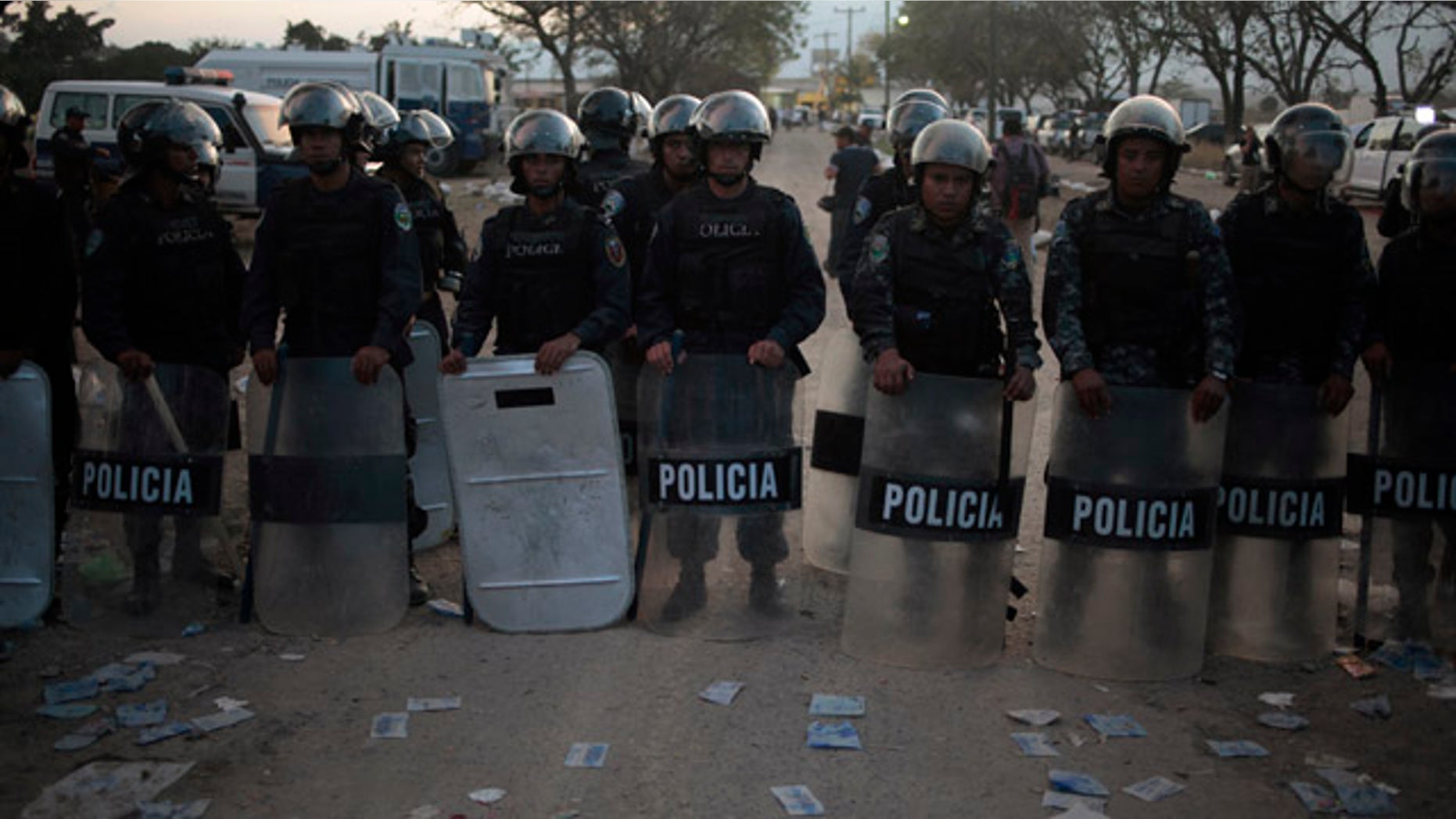 Feb. 15: Policemen stand guard outside a jail in Comayagua, about 45 miles north of the capital Tegucigalpa.