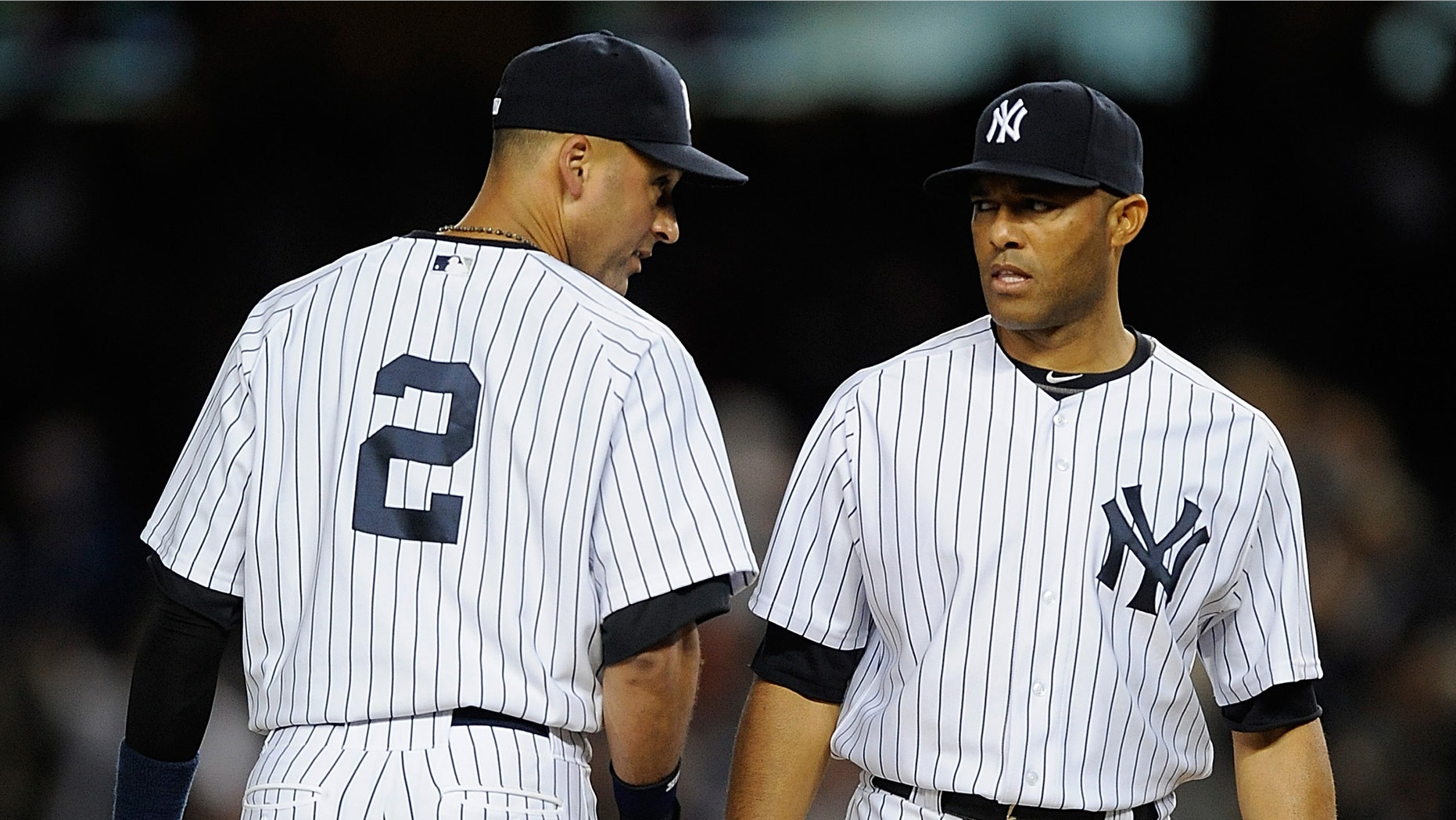 Rivera and Jeter during Game One against the Detroit Tigers on October 1, 2011 in New York City.