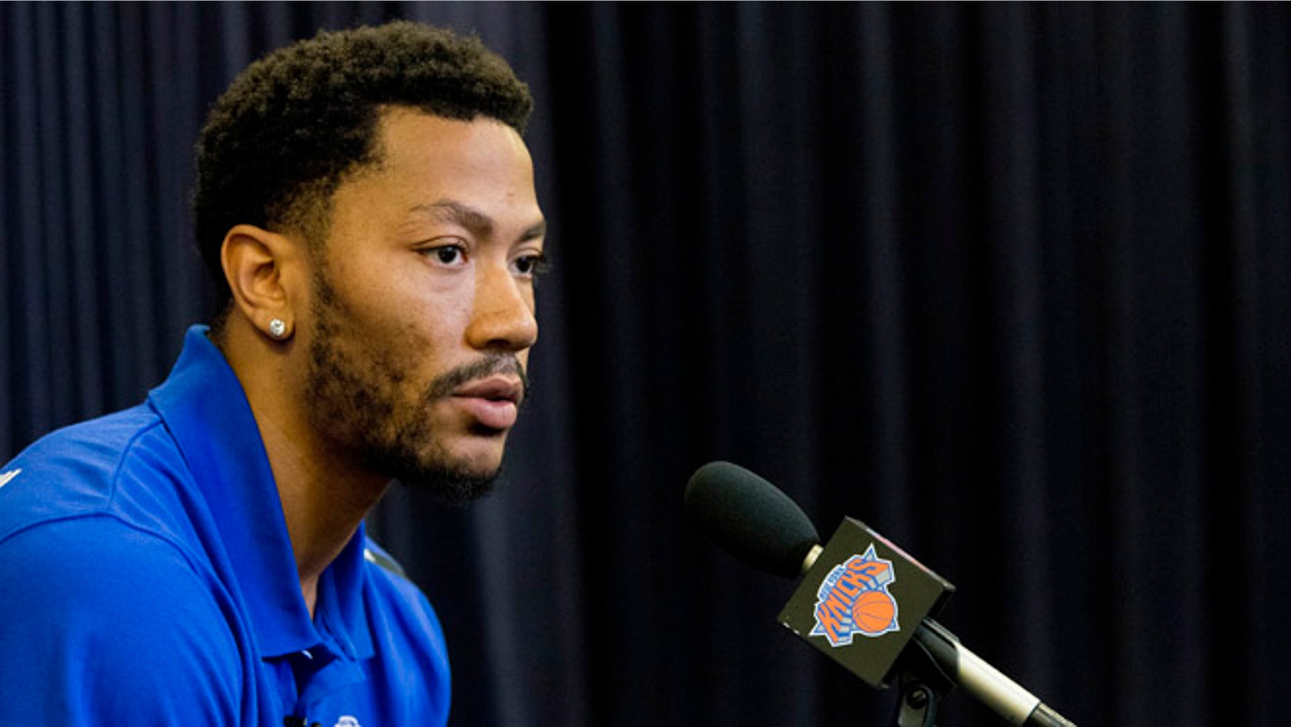 FILE - In this June 24, 2016, file photo, Derrick Rose speaks during a news conference for the New York Knicks to announce they acquired him from the Chicago Bulls at Madison Square Garden in New York. A Los Angeles federal judge ruled Tuesday, Sept. 20, that a woman accusing NBA star Rose of rape cannot remain anonymous at her upcoming civil trial. (AP Photo/Mary Altaffer, File)