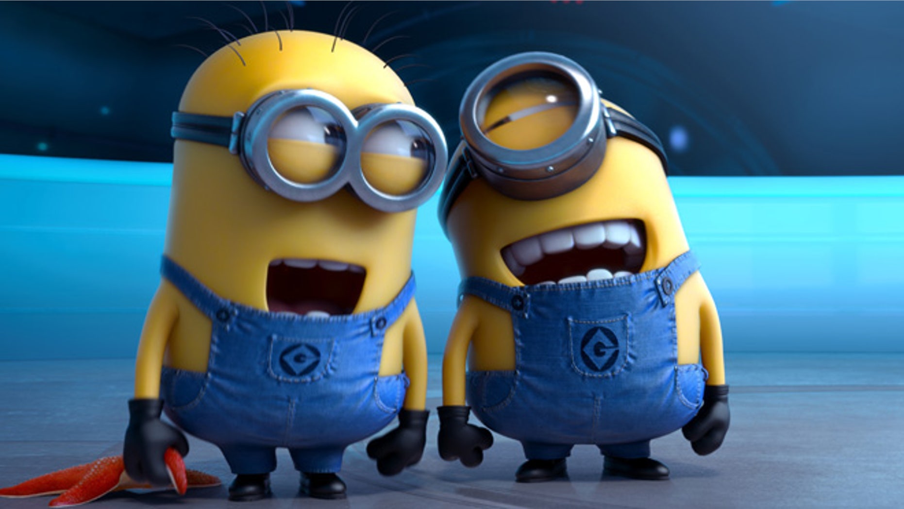 This file photo provided by Universal Pictures shows the minion characters in the film "Despicable Me 2."