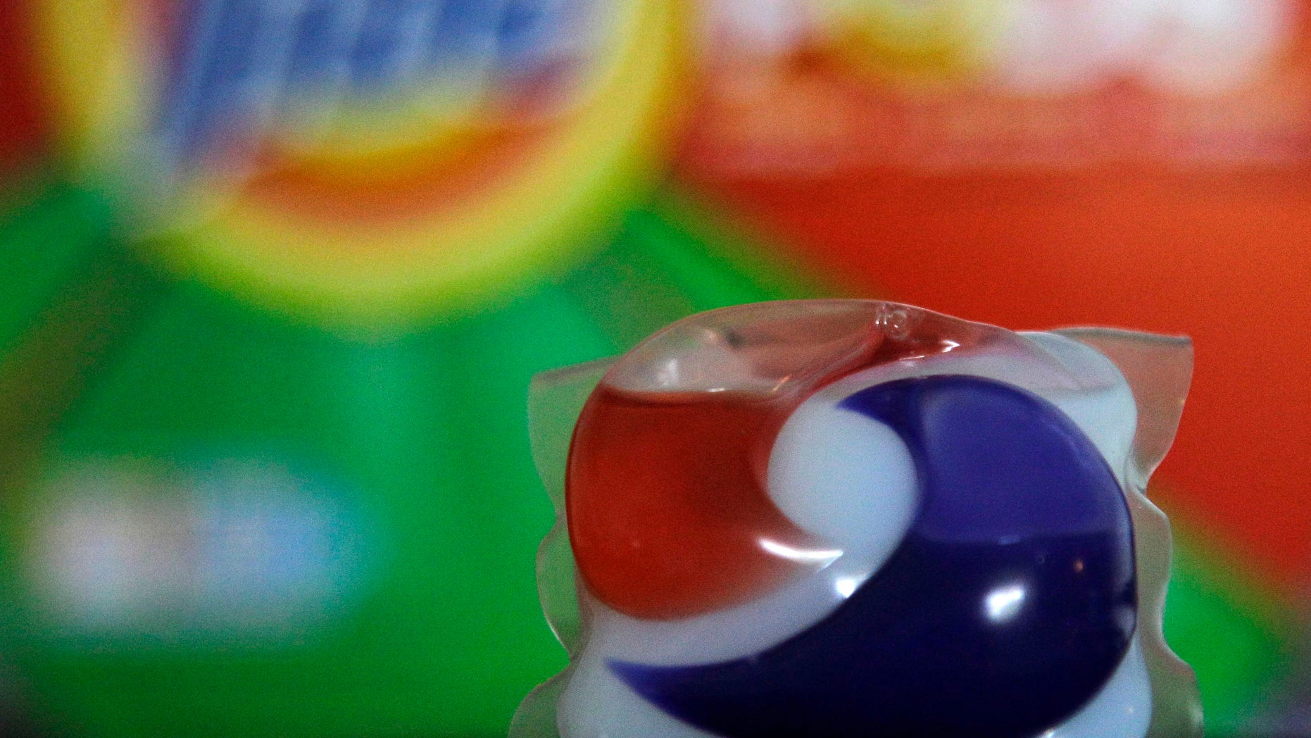 Laundry detergent makers introduced miniature packets in recent months such as this one photographed Thursday, May 24, 2012, in Houston. But doctors across the country say children are confusing the tiny, brightly colored packets with candy and swallowing them. Nearly 250 cases have been reported to poison control centers. (AP Photo/Pat Sullivan)