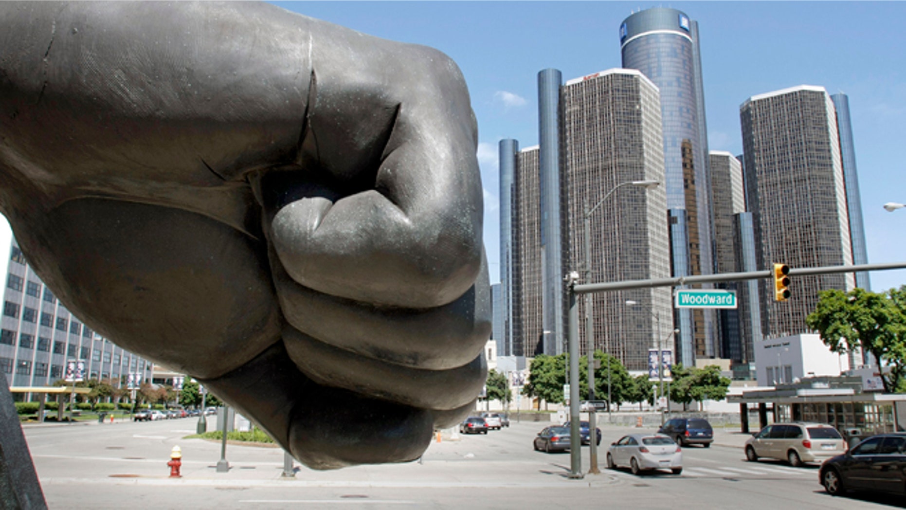 A hand of a large sculpture extends near the General Motors world headquarters on the eve of a possible GM bankruptcy filing May 31, 2009 in Detroit, Michigan.(Photo by Bill Pugliano/Getty Images)